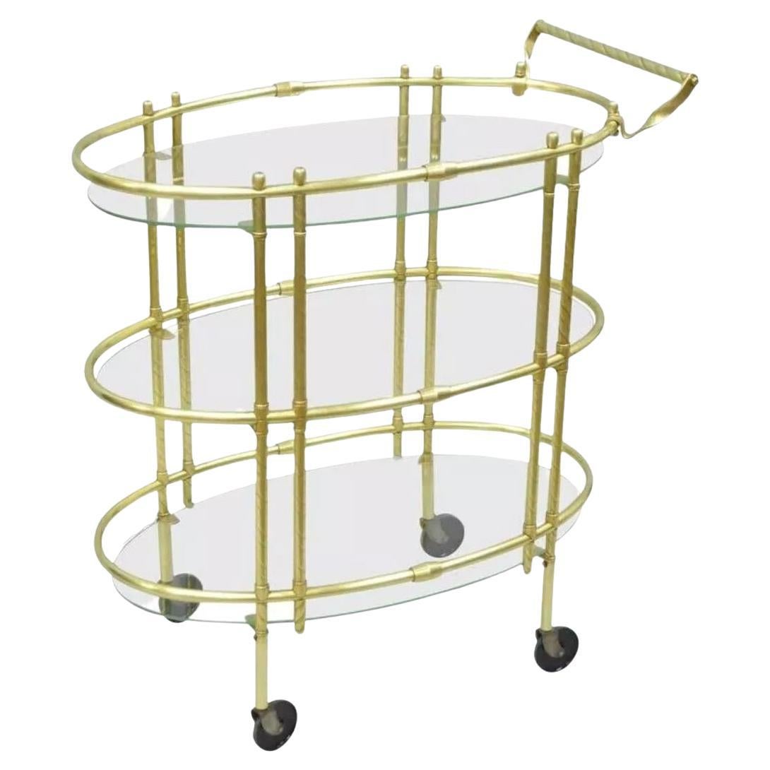 Carrello da tè bar ovale a tre livelli in ottone lucido e vetro del Mid Century Italiano Moderno