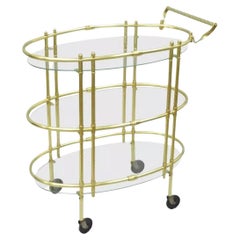 Moderno italiano de mediados de siglo Carrito de té ovalado de tres pisos de latón pulido y cristal