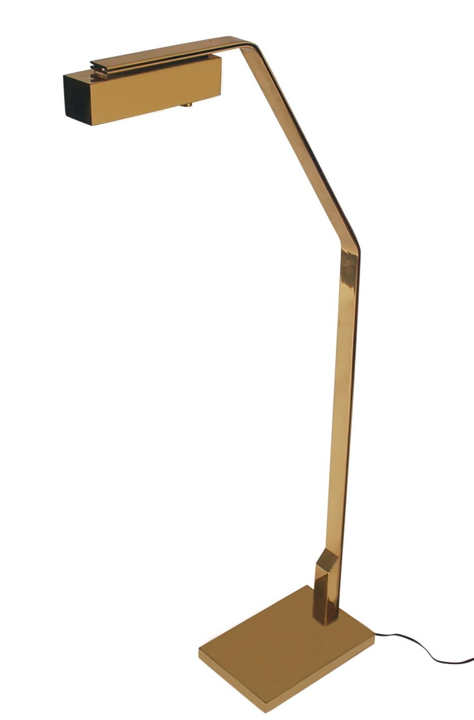 An impressive and finely crafted lamp made by Casella in the 1970s from Italy. It features heavy brass construction, pivoting lamp head, and dimmer switch. Works with one standard size bulb.