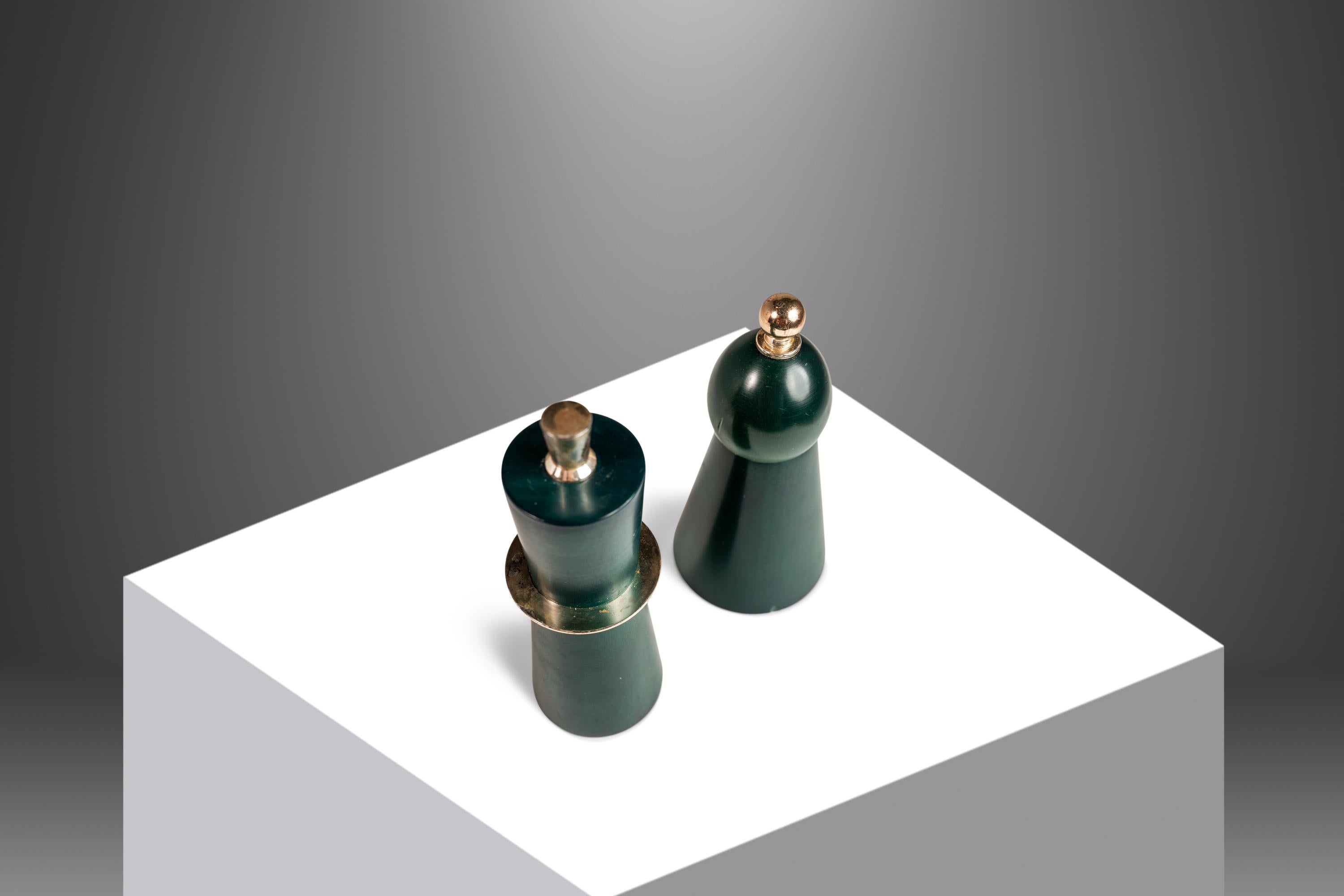 Introducing an artfully-crafted set of Italian-made salt and pepper shakers. Carved from solid ash and dyed with a dreamy acid-green finish this captivating set is as functional as it is aesthetically mesmerizing. Resembling King and Queen chess
