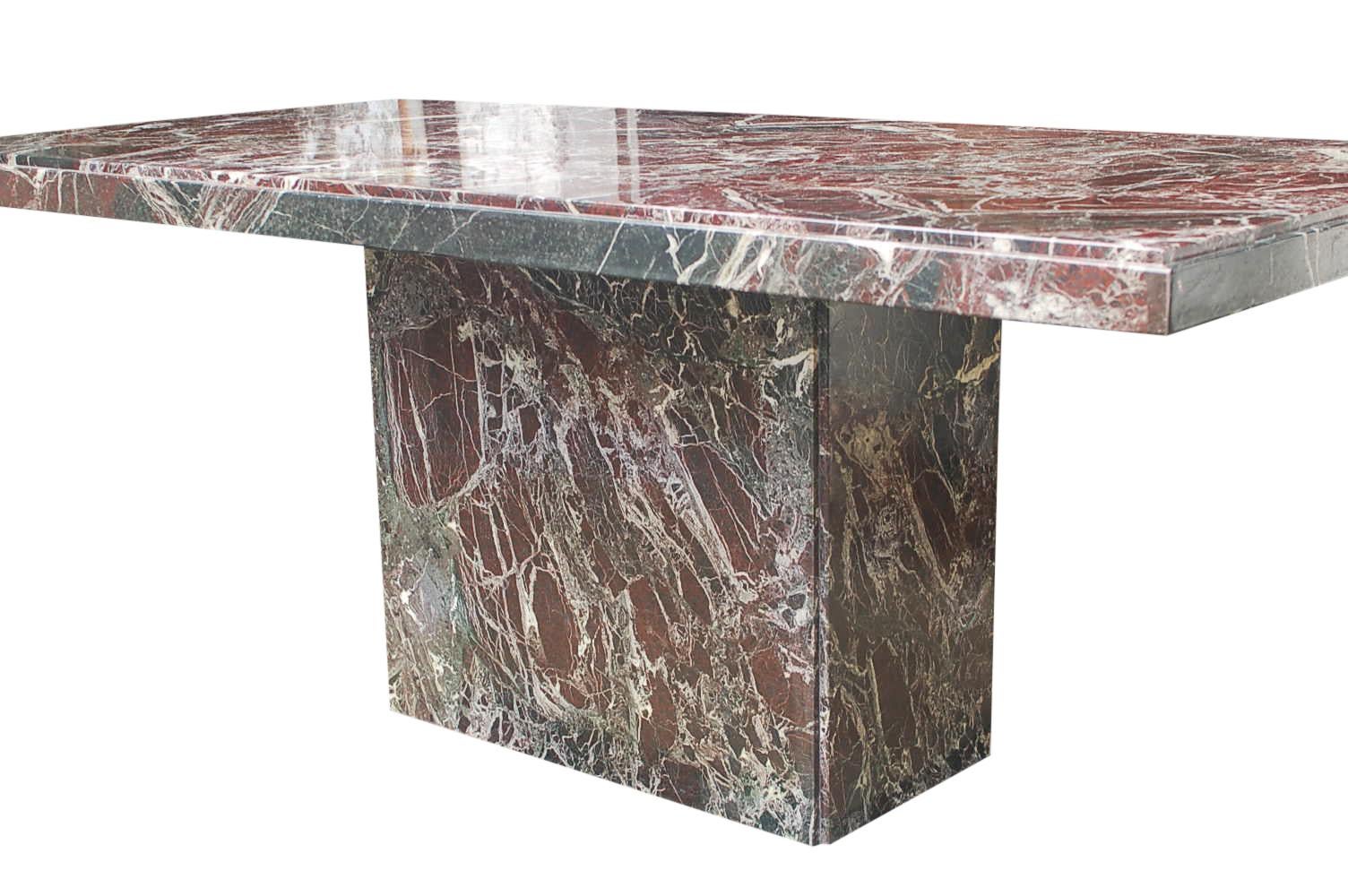 A large and impressive marble dining table from Italy, circa 1970s. It features all slab marble construction in shades of black, gray, burgundy and white.