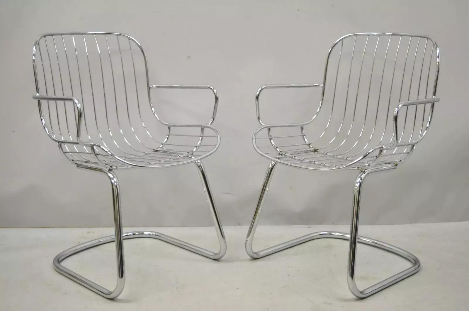 Vintage Mid Century Italian Modern Tubular Chrome Cantilever Dining Arm Chair - Set of 4. Listing includes (4) armchairs, sleek chrome cantilever frames, very nice vintage item, great style and form. Circa Mid 20th Century. Measurements: 33