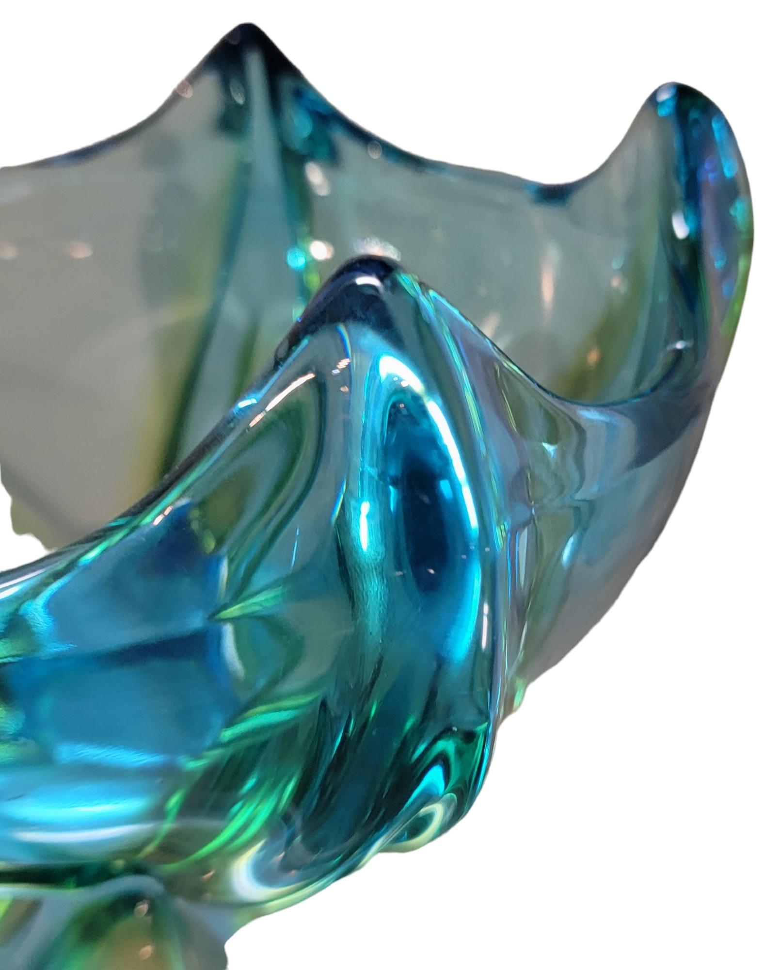 Mid Century Italian Murano Art Glass Bowl with great texture color and look. The Glass bowl has a wonderful starfish or floral design extending itself from the center to the edges of the bowl as to be resting over the curvature. Wonderful designer