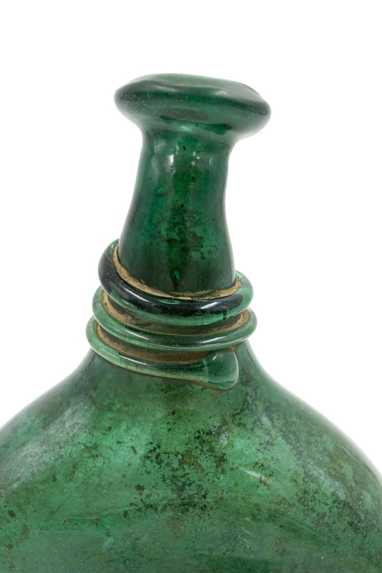 Mid-Century Italian Venetian Murano hand blown dark green glass flask.
      