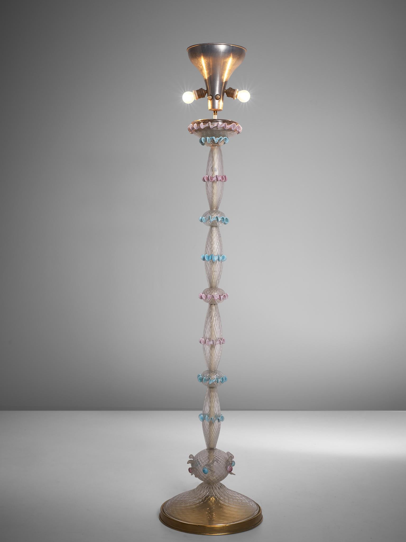 Floor lamp, Murano glass and brass, Italy, 1950s-1960s.

Handcrafted Midcentury floor lamp in clear Murano glass, decorated with several pastel colored, glass wrinkled ornaments. The clear glass base is build up from hourglass shaped elements that