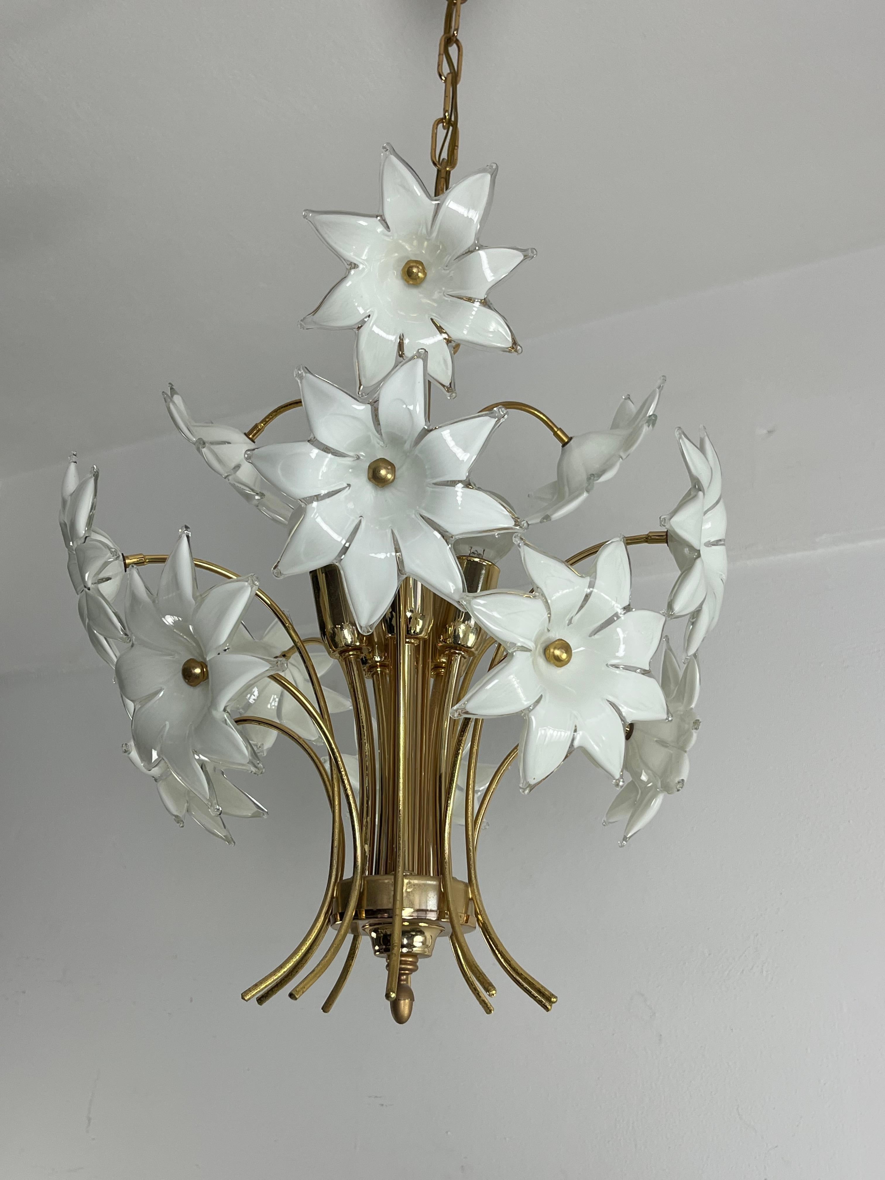 Mid-century Italian Murano glass floral chandelier, 1970s
5-lights, e14 lamps.
Good condition, small signs of aging.
Golden metal structure.