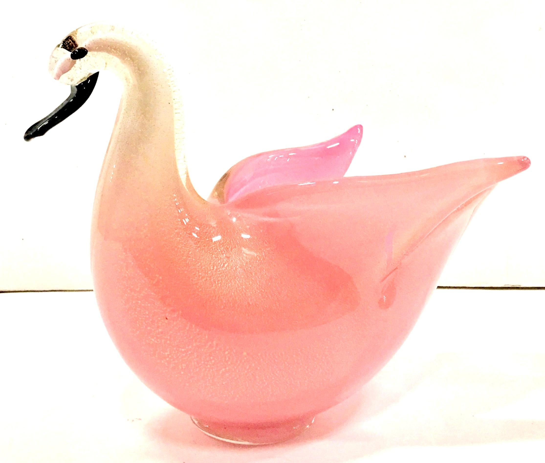 20th Century Coveted pink with gold flecks figural Italian Murano glass swan bowl. Features a pink body that fades to white and clear. The swan head details are finished in black. Gold fleck detail throughout.