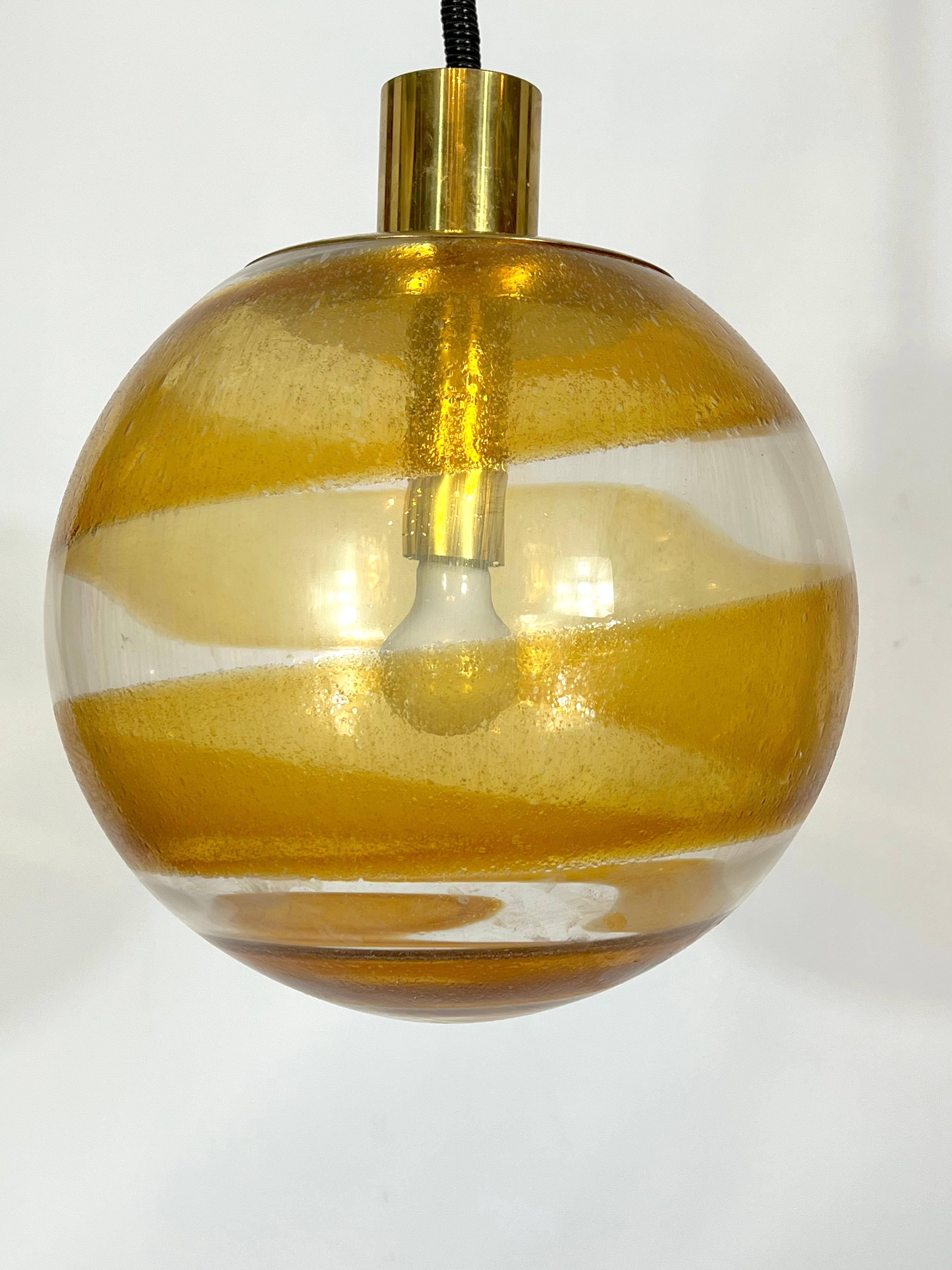 Brass Mid-century Italian Murano glass sphere pendant lamp from 60s For Sale