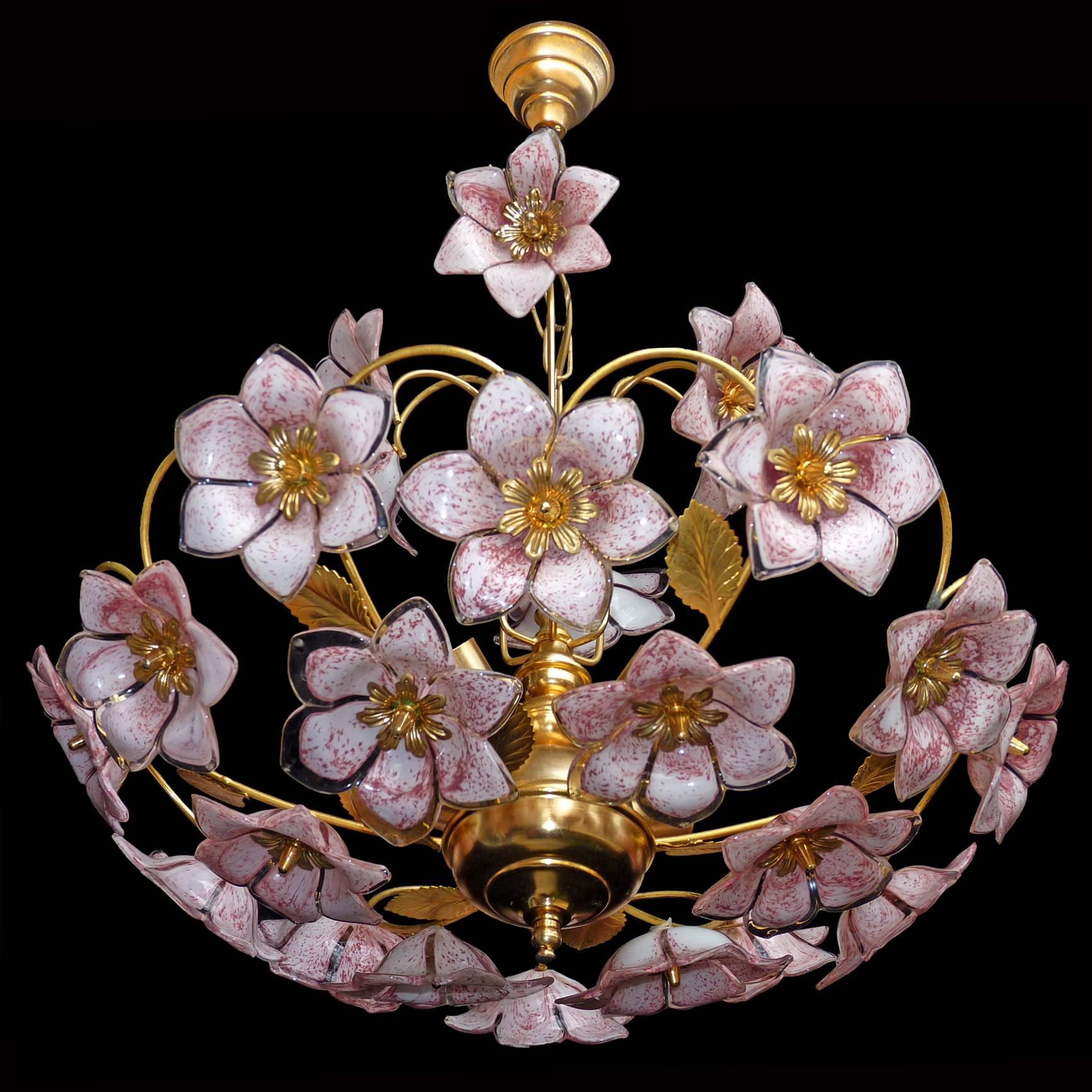 1960s vintage Italian Murano flower bouquet after Venini art-glass/ 24 hand-blow white and clear glass flowers and gold-plated brass.
Measures: 
Diameter 22 in/ 55 cm
Height 30 in/ 75 cm
Weight: 11 lb/5 Kg
Four light bulbs E14/ 60 W, good
