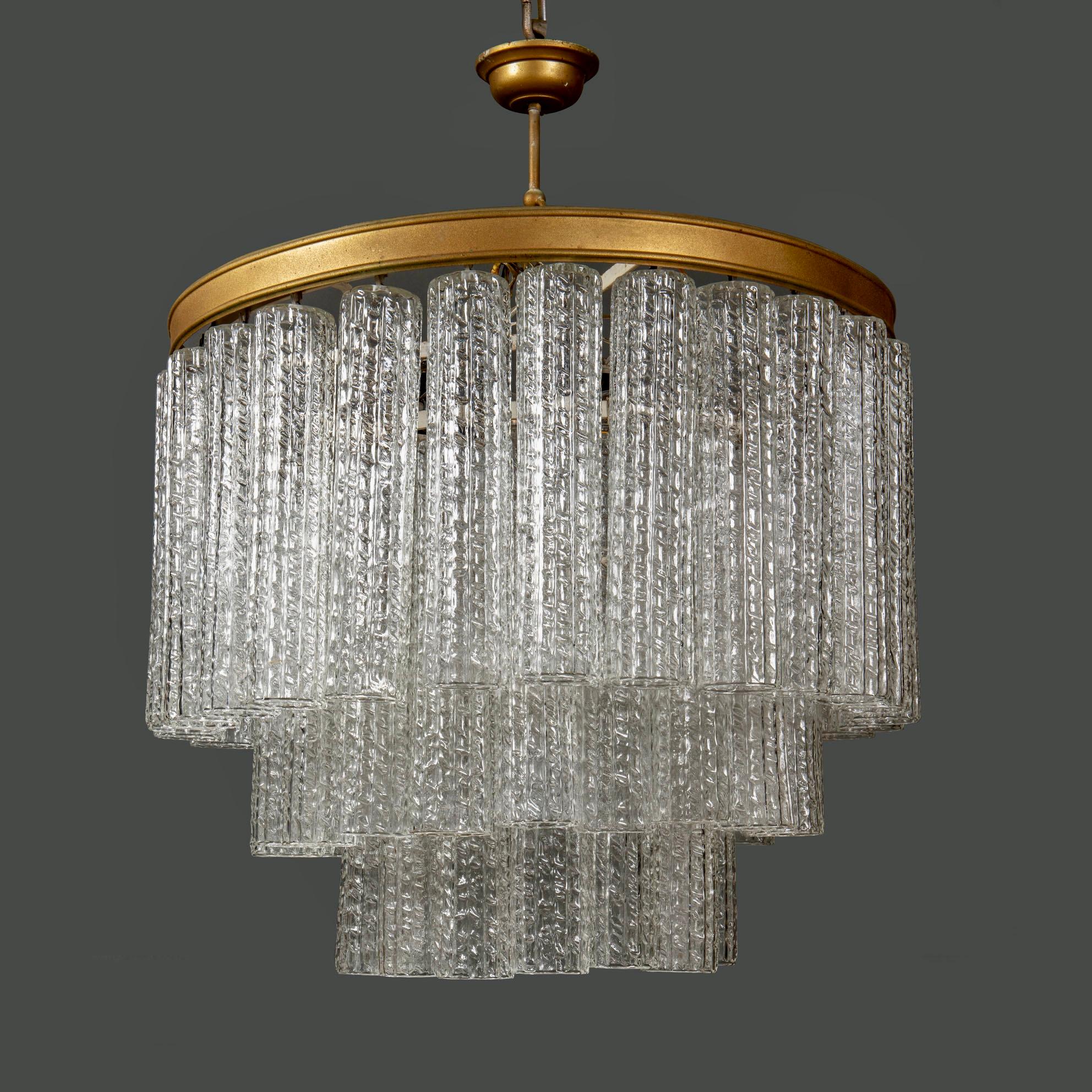 ORIGINAL Mid-Century Modern Hollywood Regency chandelier comprised of three tiers of hand blown Murano 