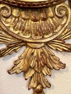 Horloge murale néoclassique italienne du milieu du siècle, en bois doré, signée Palladio.