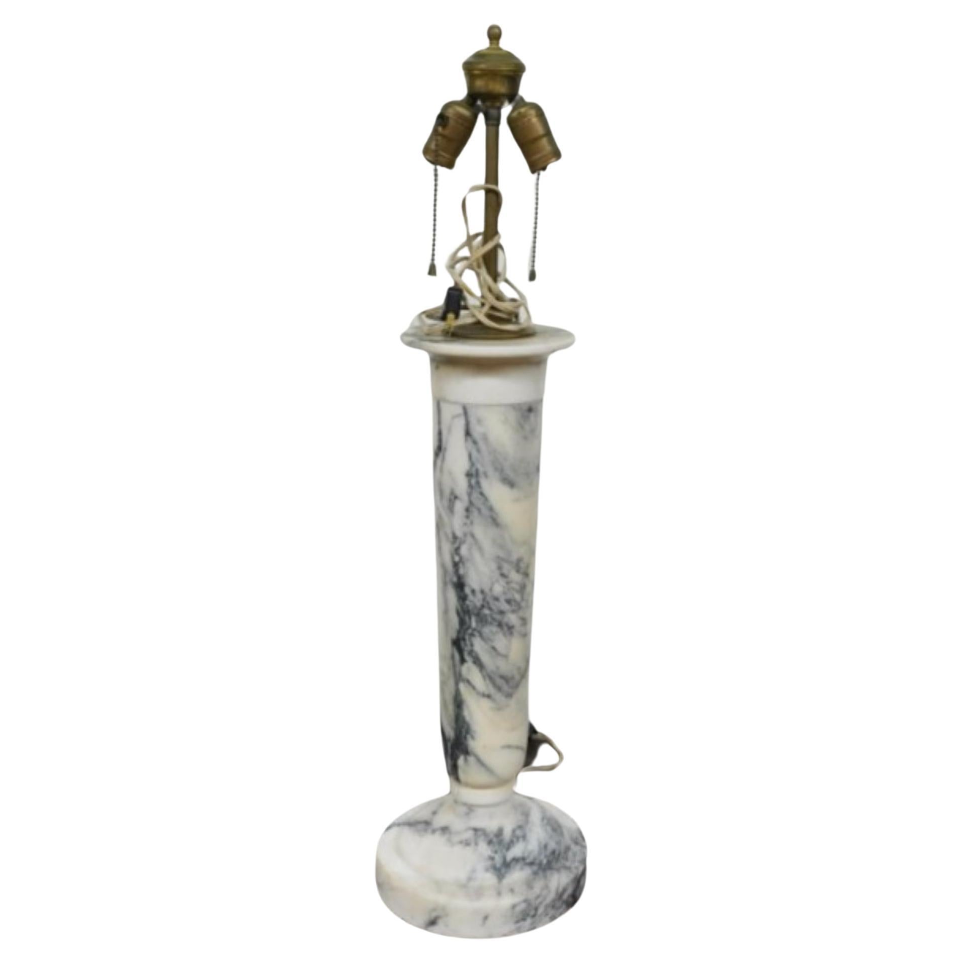 A stylish Italian Neoclassical Style two light Marble Table Lamp. Very good condition. Measures .
Measures 6