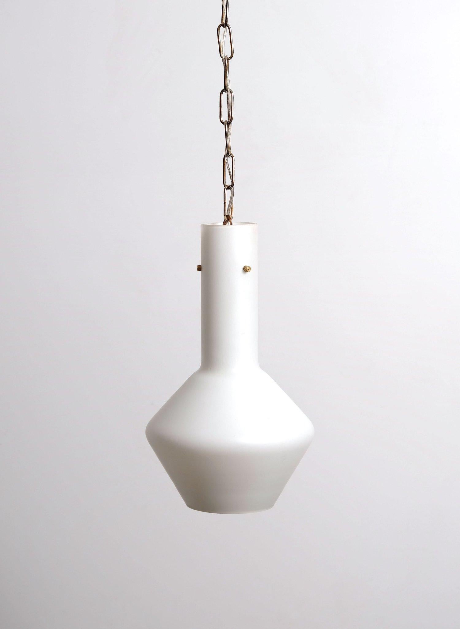 Mid century Italian opaline cased glass pendant. Brass fittings, worn brass-on-steel plated chain and canopy. 40-60 watts max G-12 candelabra incandescent bulbs recommended or higher if LED/CFL.

CREATOR: unknown

PERIOD: 1950-1959

COUNTRY OF
