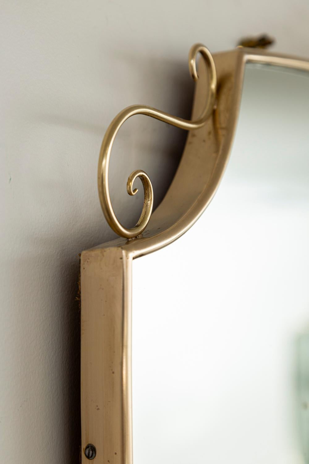 Mid Century Italian Oval Shield Shaped Mirror With Decorative Scrolls For Sale 2