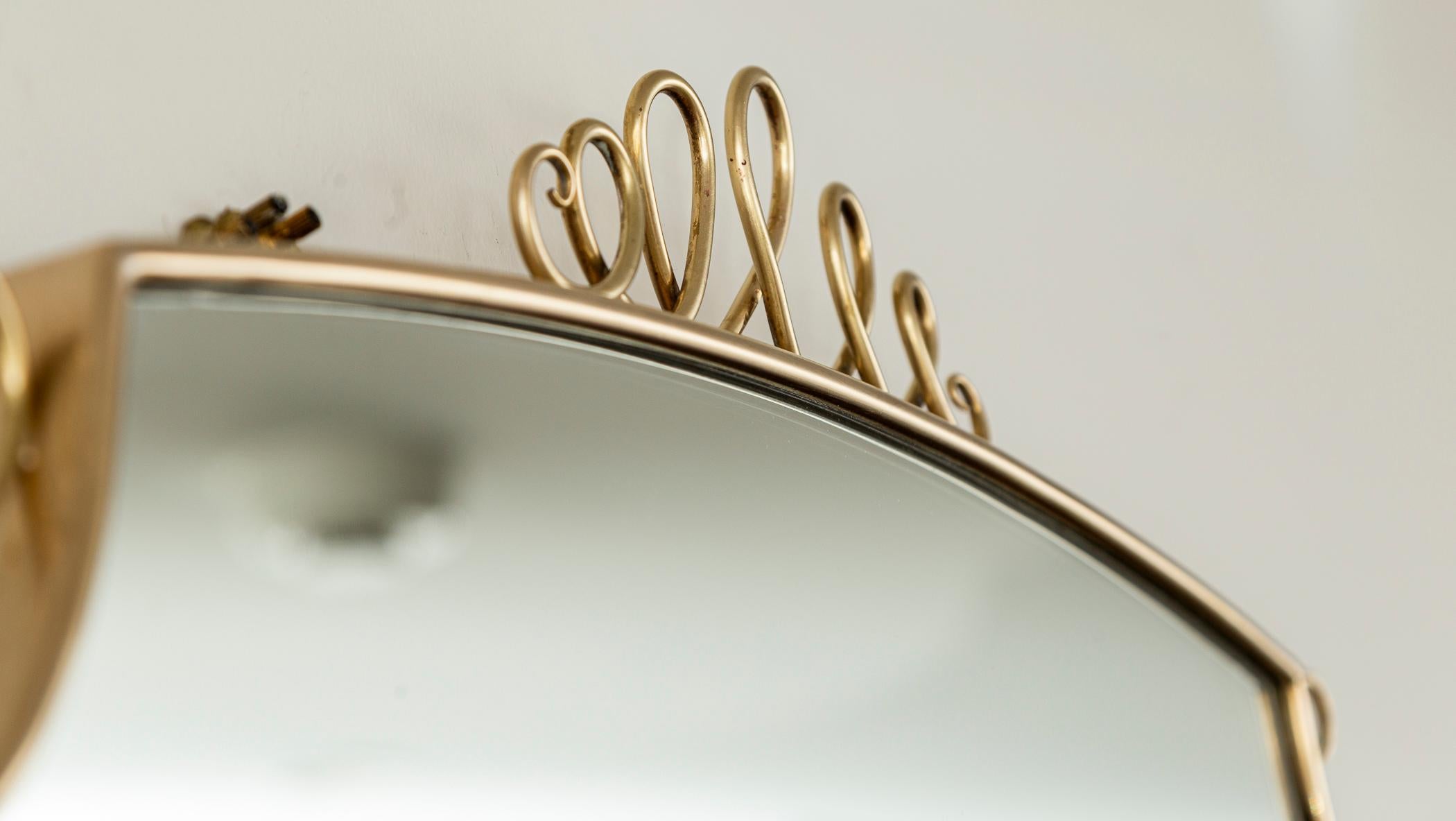 Mid Century Italian Oval Shield Shaped Mirror With Decorative Scrolls For Sale 3