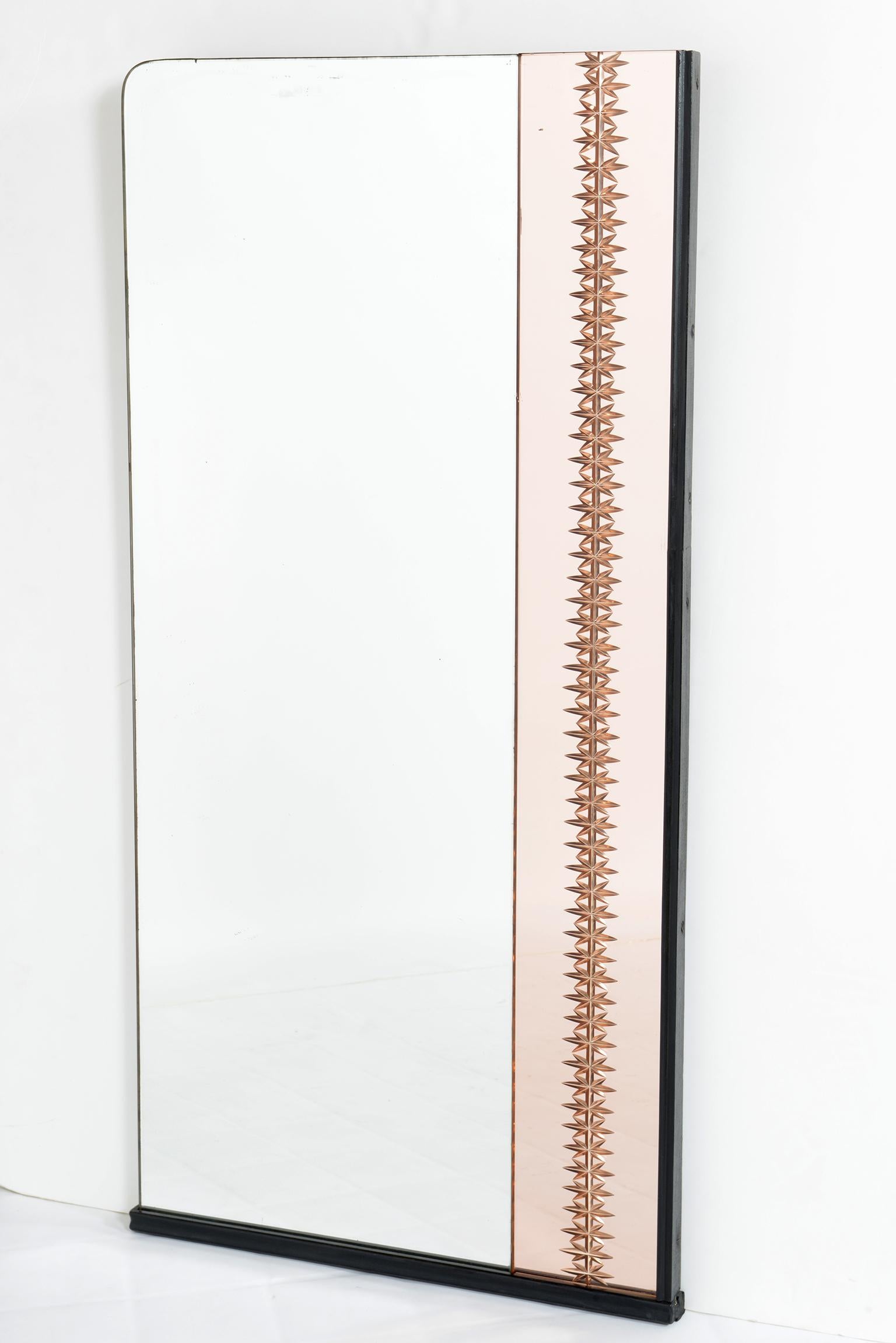 Pair of 1940s Italian midcentury mirrors with black lacquered wooden frame, each with a band in peach-colored mirror with star-engraved decoration. Right and left.
 