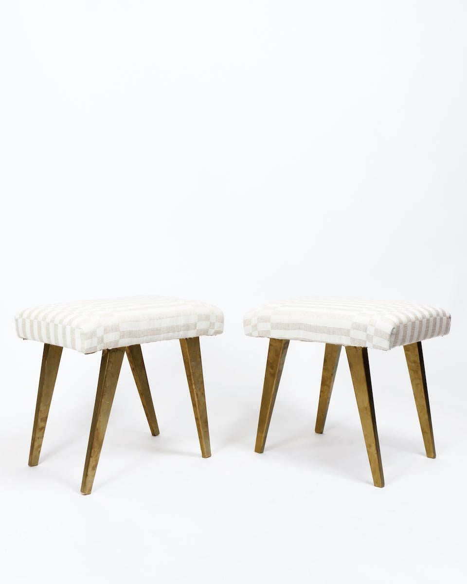 Mid-century design 1960s Italian pair of stools newly upholstered and brass. 


Dimensions: H42 x W46 x D33 cm.