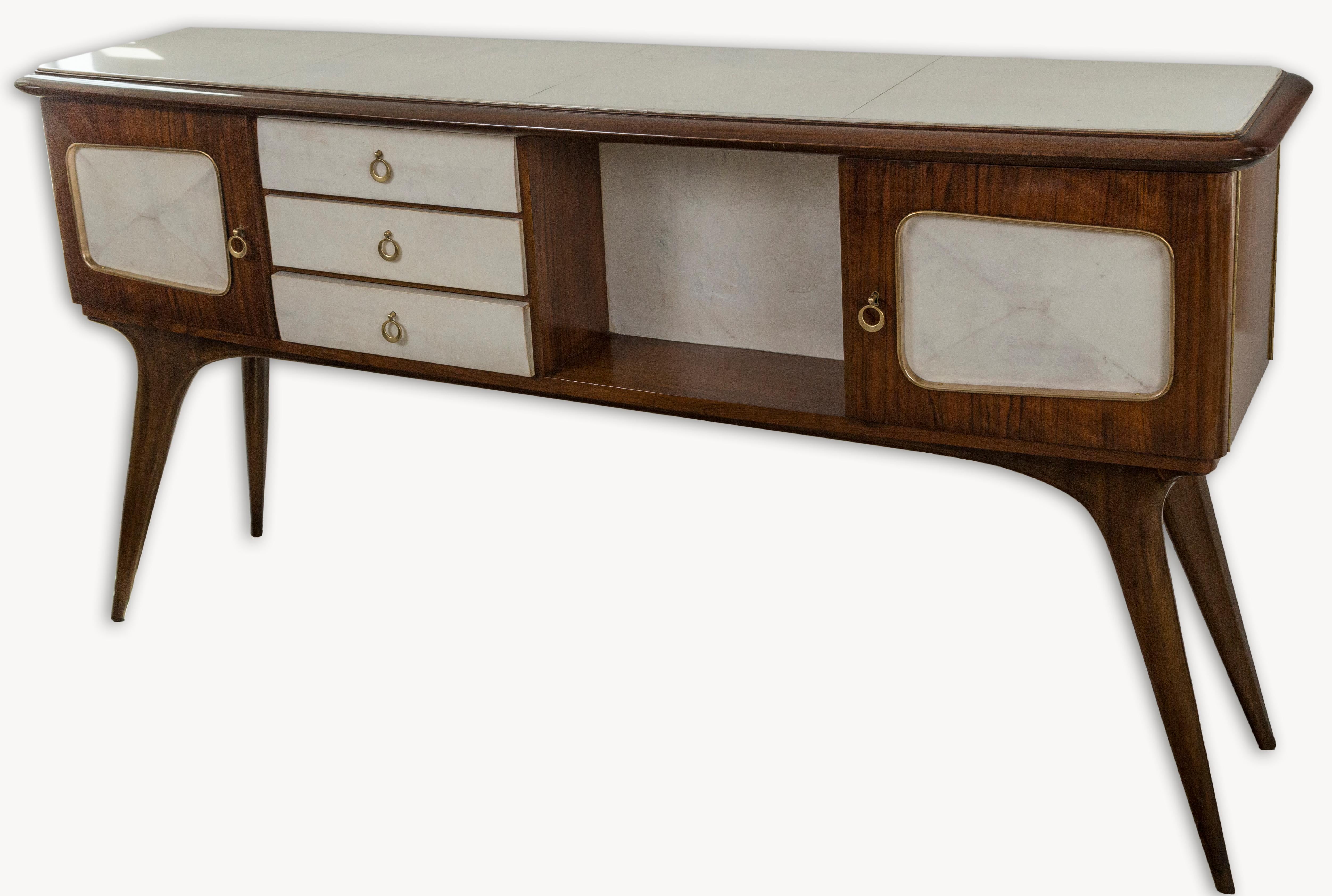 Finely crafted mid century Italian credenza finished on both sides are mirror images of each other. Originally intended as a center piece dividing a room, the credenza/console also works well against a wall as a one sided piece. Comprised of a