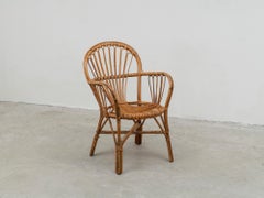 Fauteuil italien du milieu du siècle dernier en rotin organique patiné et bambou, années 1960