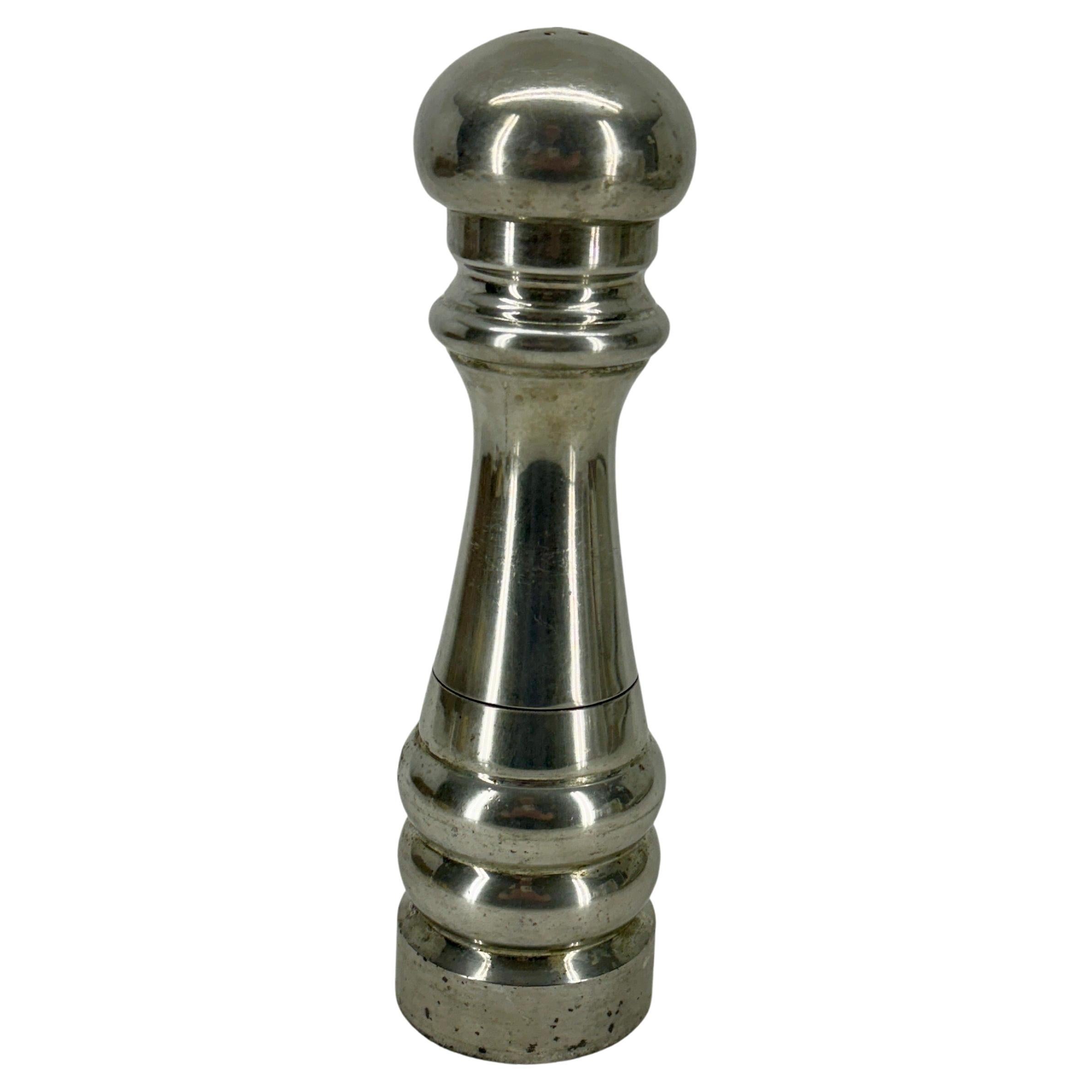 Pewter Salt and Pepper Shaker, MCM Italy

Tall and sturdy Vintage MCM Italian salt and pepper grinder or shaker with its original patina.  Just need to untwist when ready to refill. This pewter piece, marked Made in Italy on the bottom, would make a