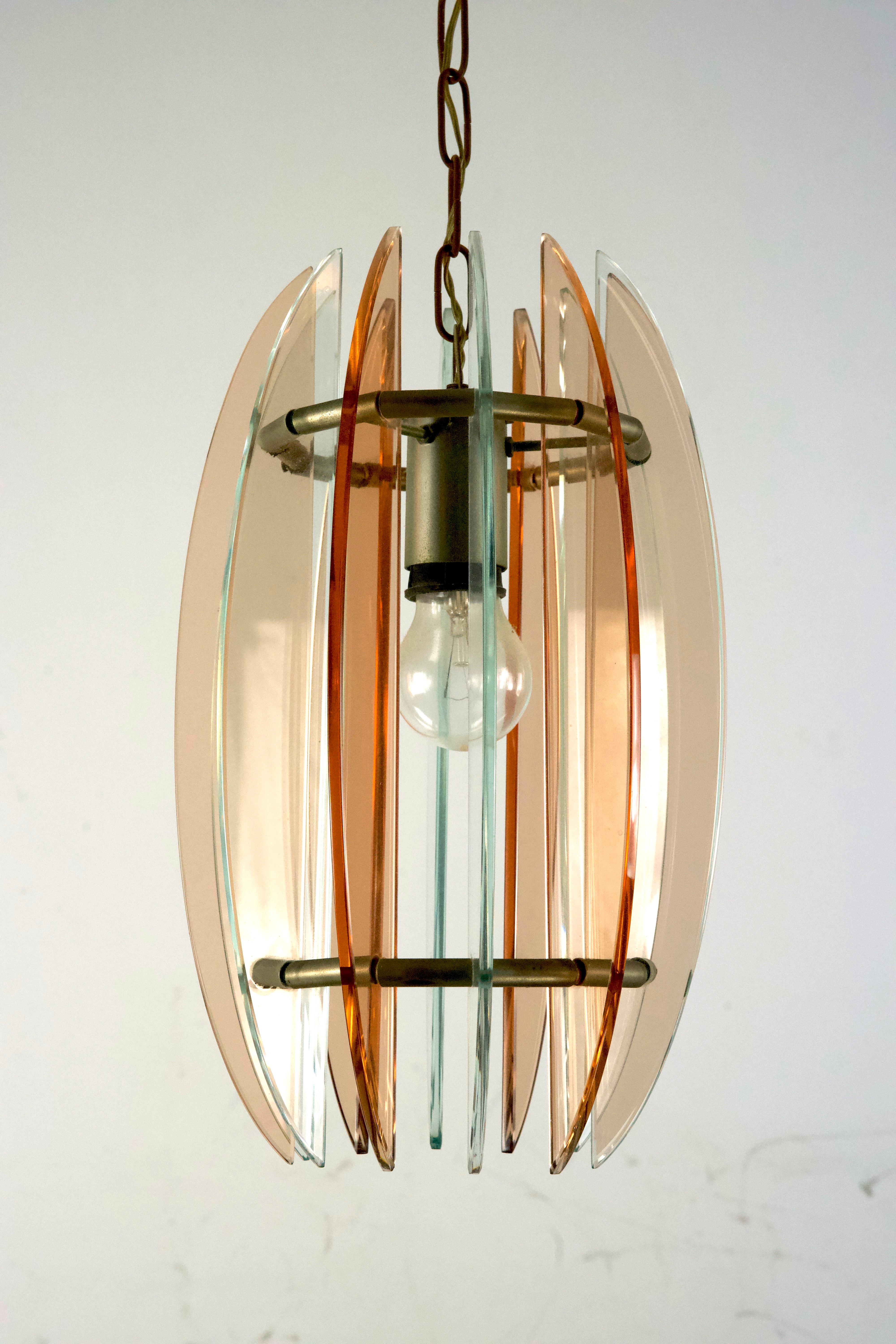 Very good vintage condition with normal trace of age and use for this pendant made from pink and clear thick glass and produced by Veca during the 60. No chips or cracks. Height of fixture 34 cm.Full working with EU standard, adaptable on demand for