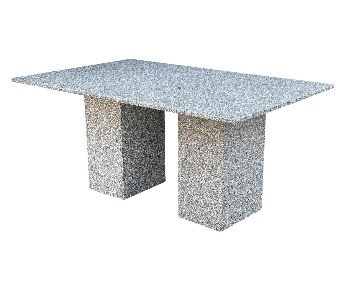 A simple form design dining table that would also make a fabulous desk. It features solid slab speckled granite construction. In very good ready to use condition.