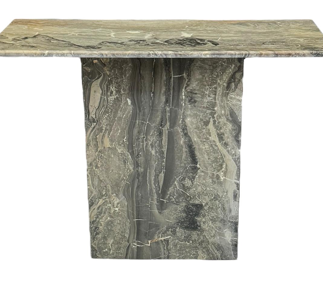 A stunning and simple modern console table from Italy circa 1970's. It consists of heavy grey solid marble. Beautiful veining in marble.