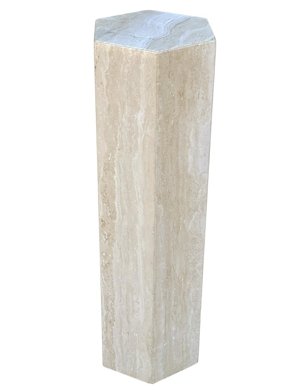 tall marble pedestal