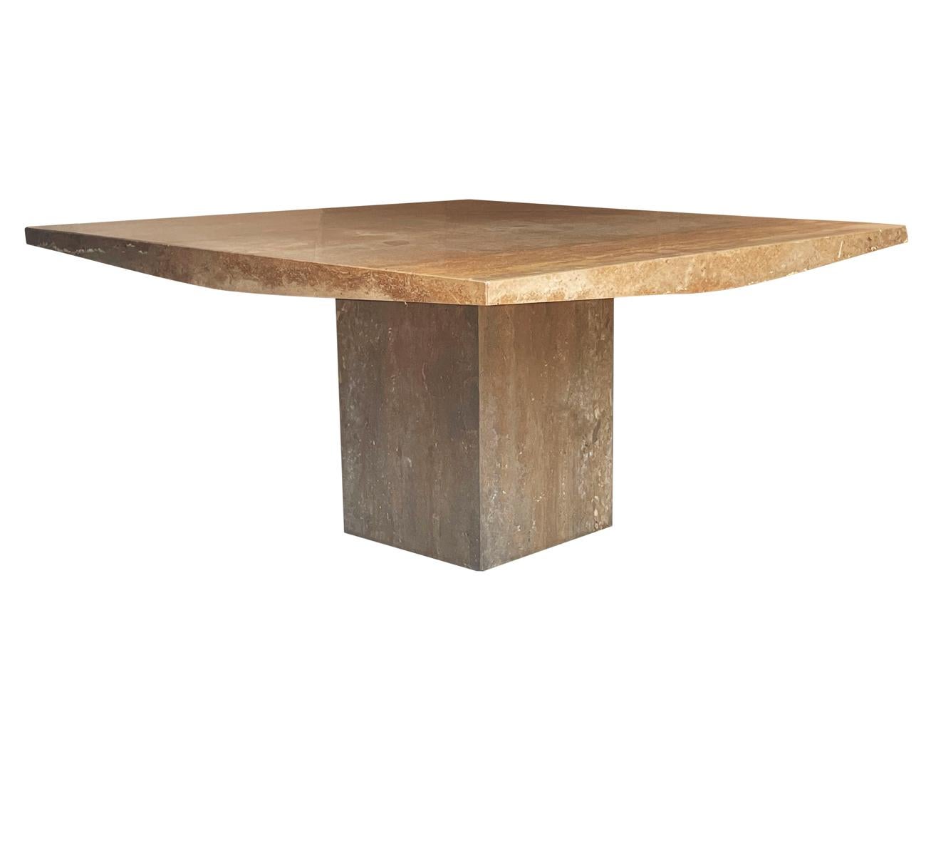 A large and stunning marble dining from Italy, circa 1990's. It features a large Square top that seat comfortably. Beautiful natural stone, marked: Made in Italy.