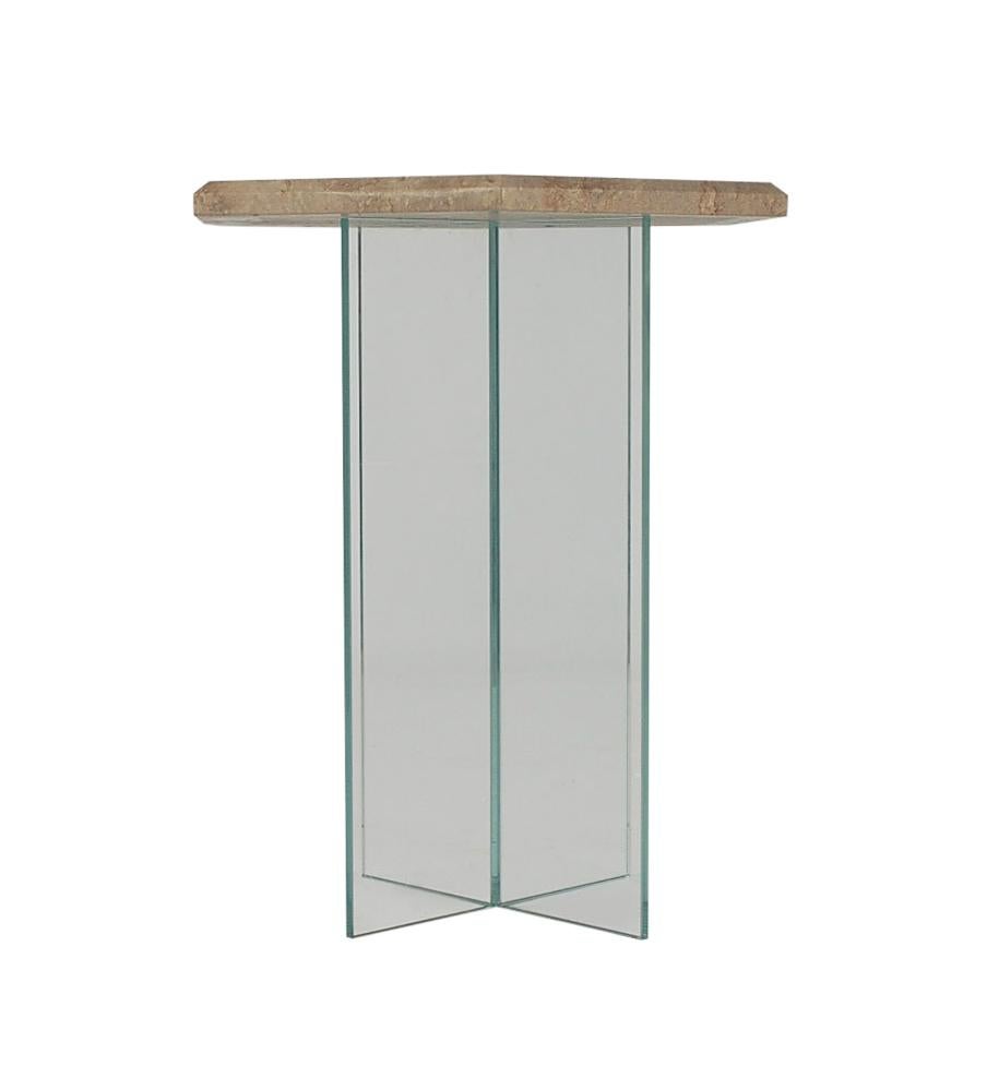 Une table d'appoint géométrique funky ou une table à boire d'Italie datant des années 1970. Il se compose d'une base en X en verre et d'un plateau hexagonal en travertin.
