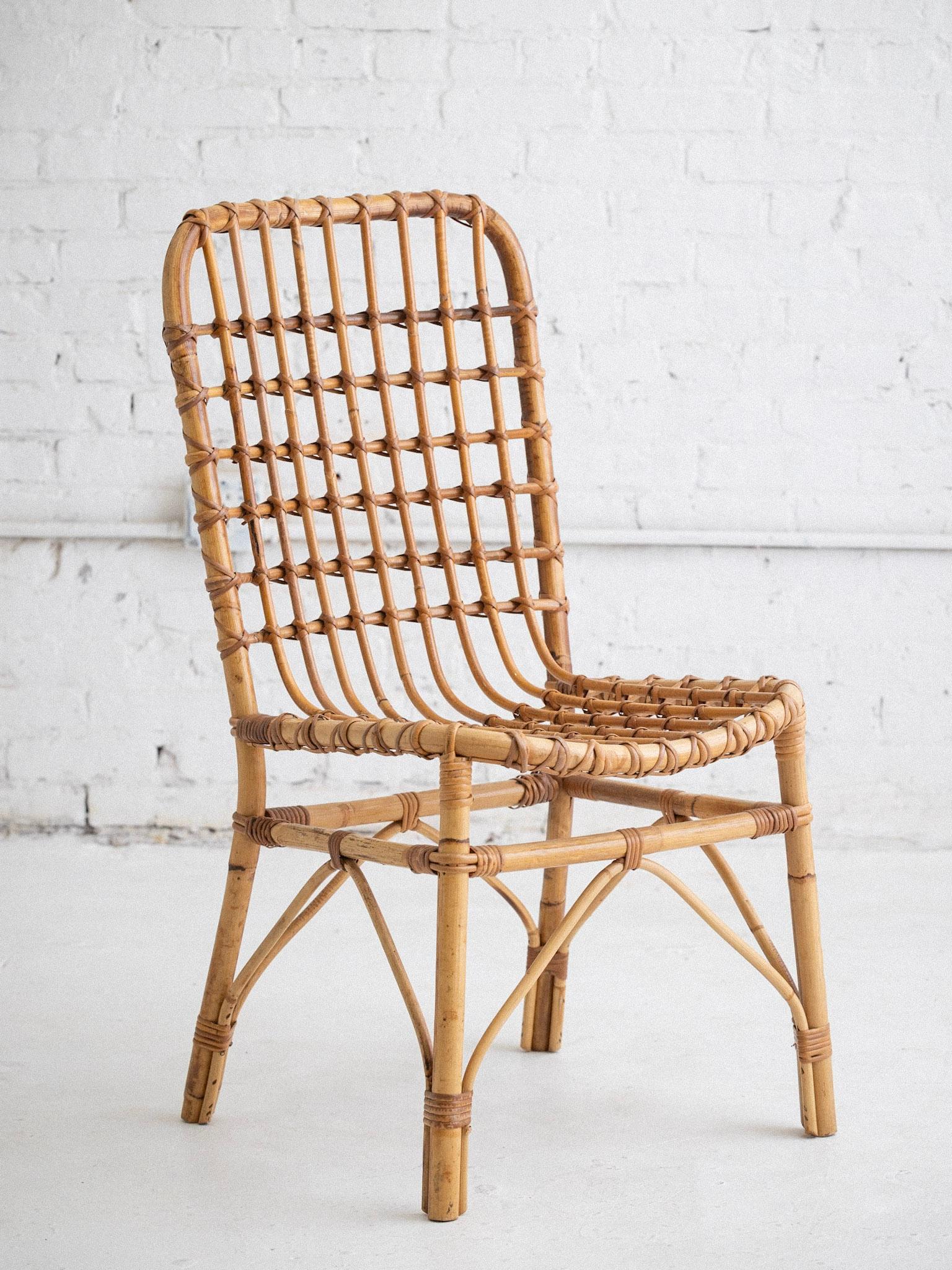 Mid century Italian rattan chair. Grid like silhouette in the style of Tito Agnoli.