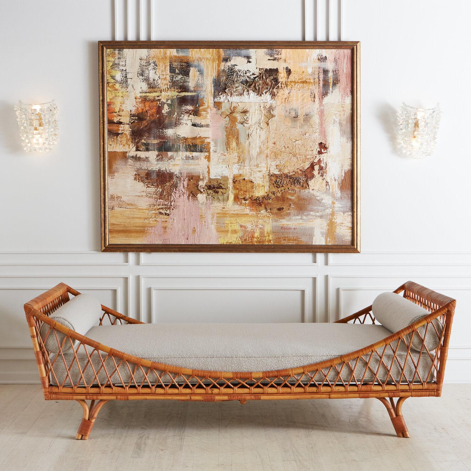 A mid century Italian daybed with a gorgeous Rattan frame. This piece has a brand new cushion covered in a dove gray wool blend fabric and completed with two custom bolster pillows. Fabric samples are available through our showroom. Italy,