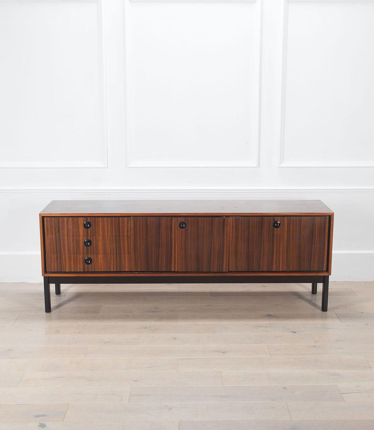 Mid-Century Italian rosewood low sideboard.
Originally from the 1960s.