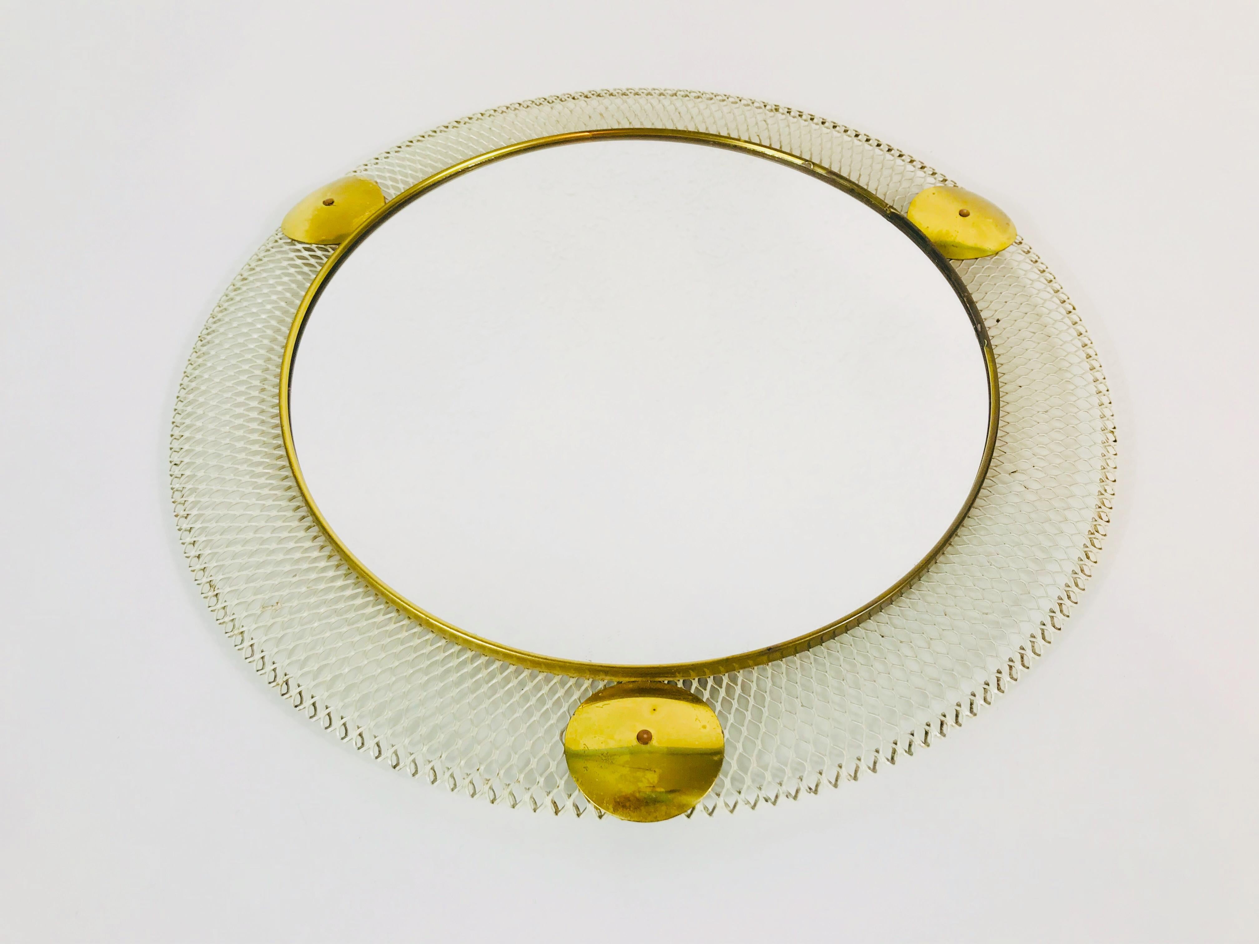 Midcentury Italian Round Metal and Brass Mirror, Italy, 1960s In Good Condition For Sale In Hagenbach, DE
