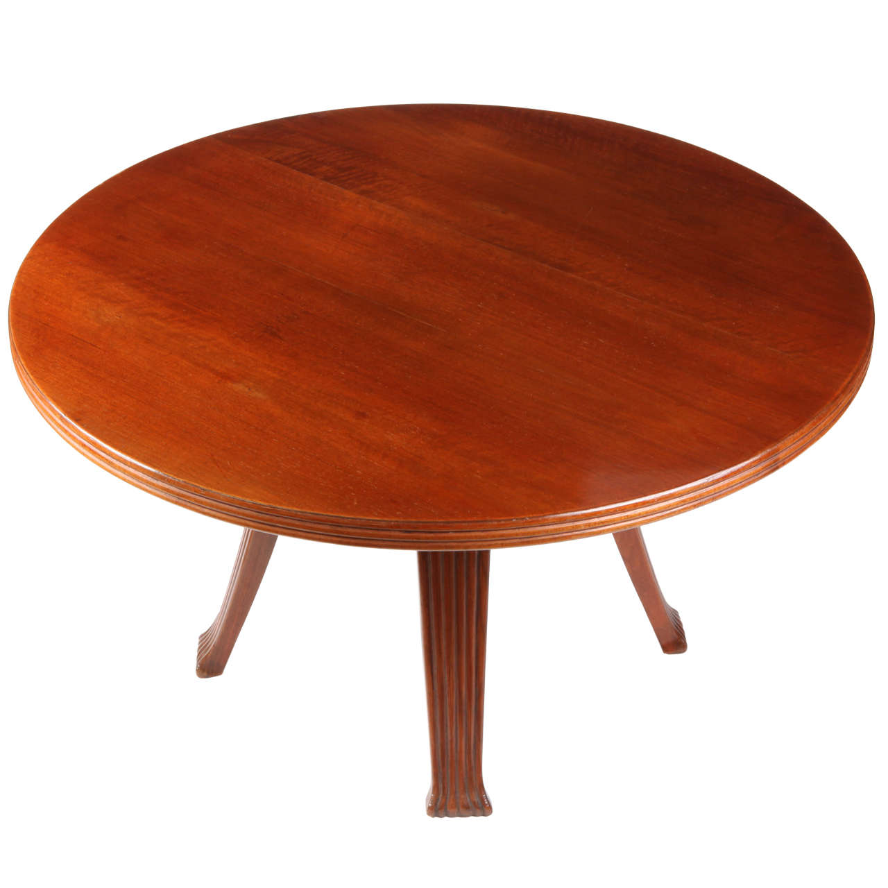 Round Italian walnut coffee table or side table with horizontally grooved edge and vertically grooved and grooved legs carved in solid walnut.
Italy, 1940 Mid-Century Modern.
  