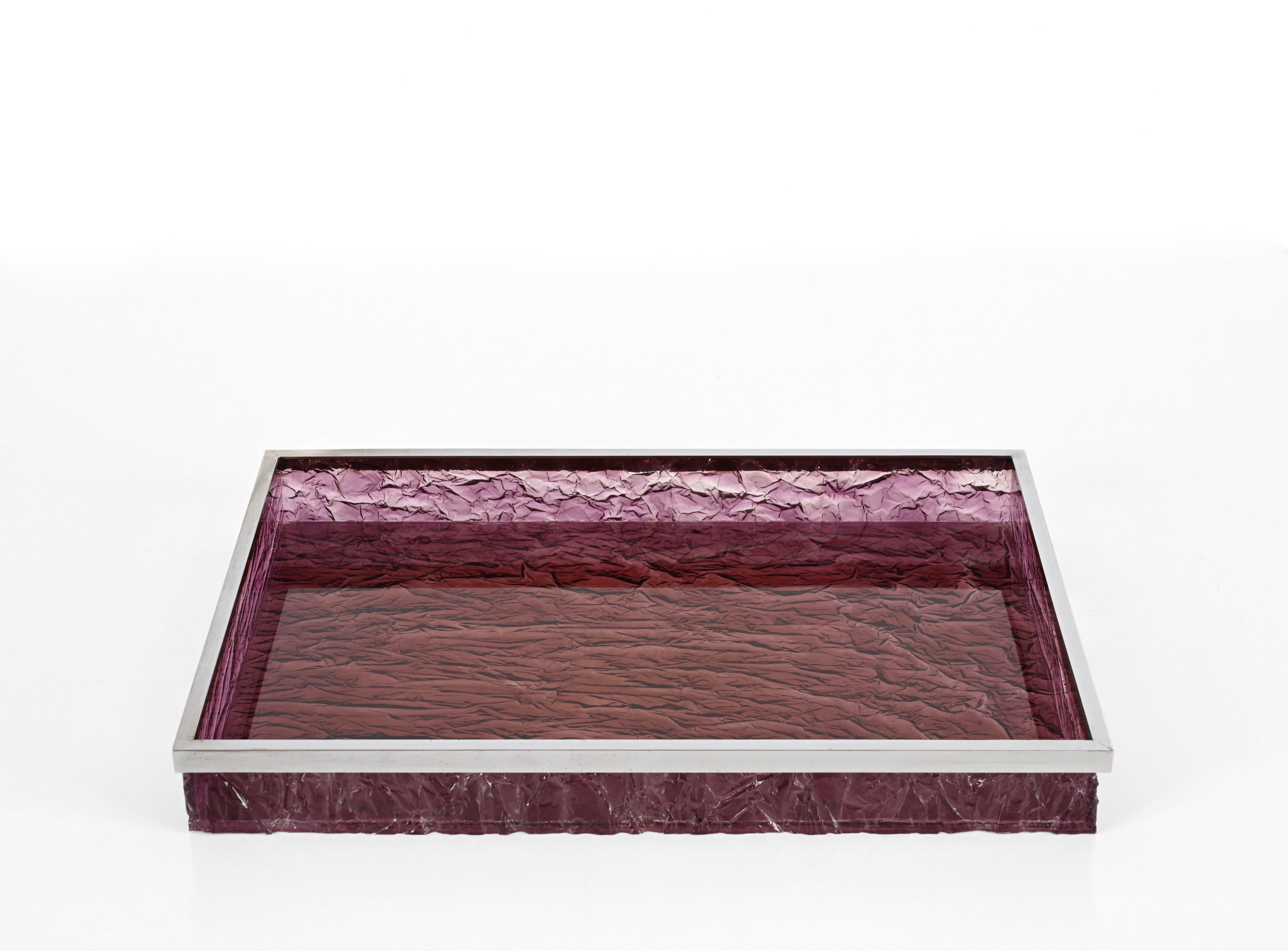 Gorgeous Mid-Century rectangular serving tray in an amazing purple ice effect lucite and chrome. This elegant piece was probably designed by Willy Rizzo in Italy in the 1970s for a Christian Dior production.

The quality of the ice effect lucite on