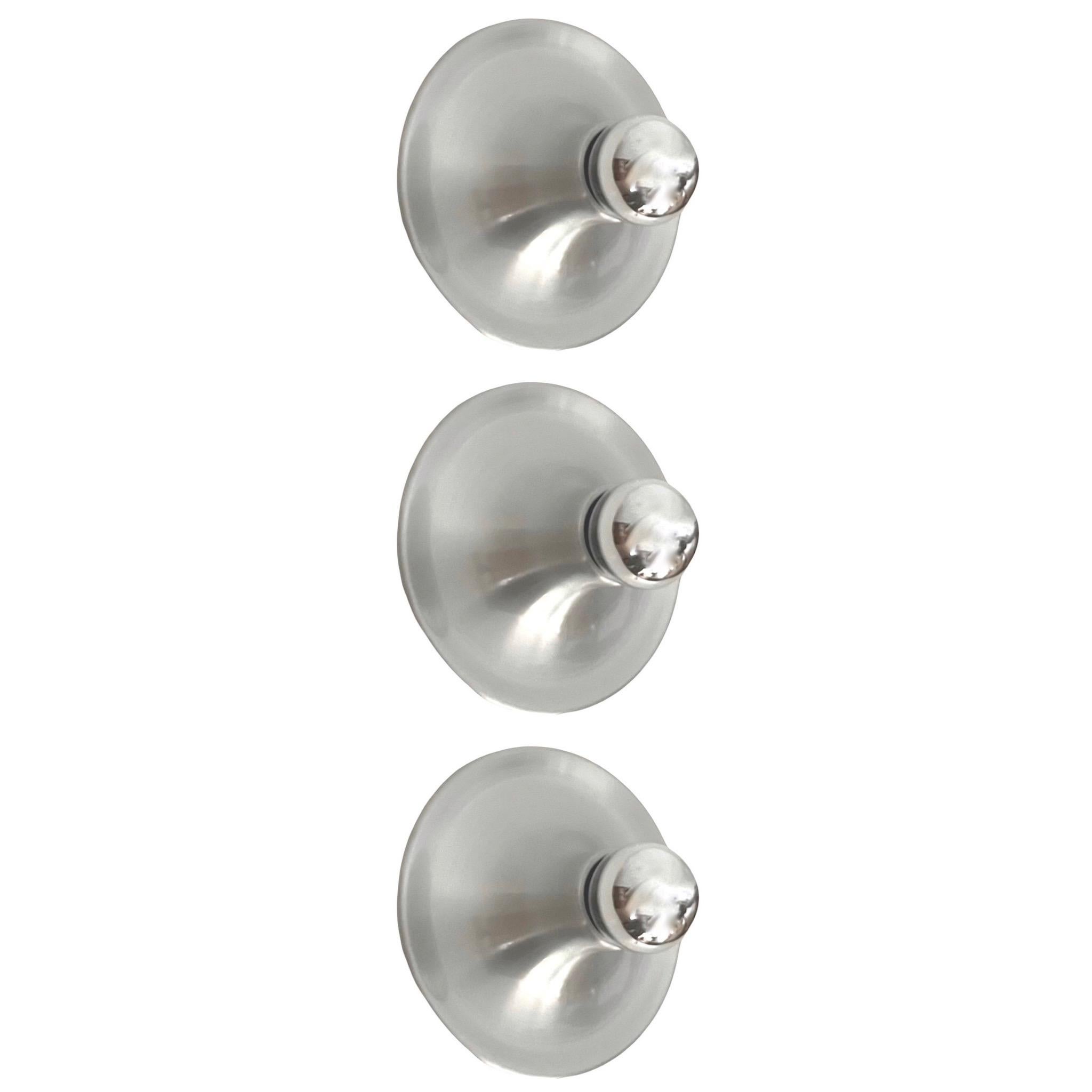 Cool Set of Three Metal Wall Sconces or Flush Mounts by Targetti Sankey. Model: 3076406. These fixtures were designed and manufactured in Italy during 1980s
These fixtures have never been used, the condition is very good. “Targetti” original sticker