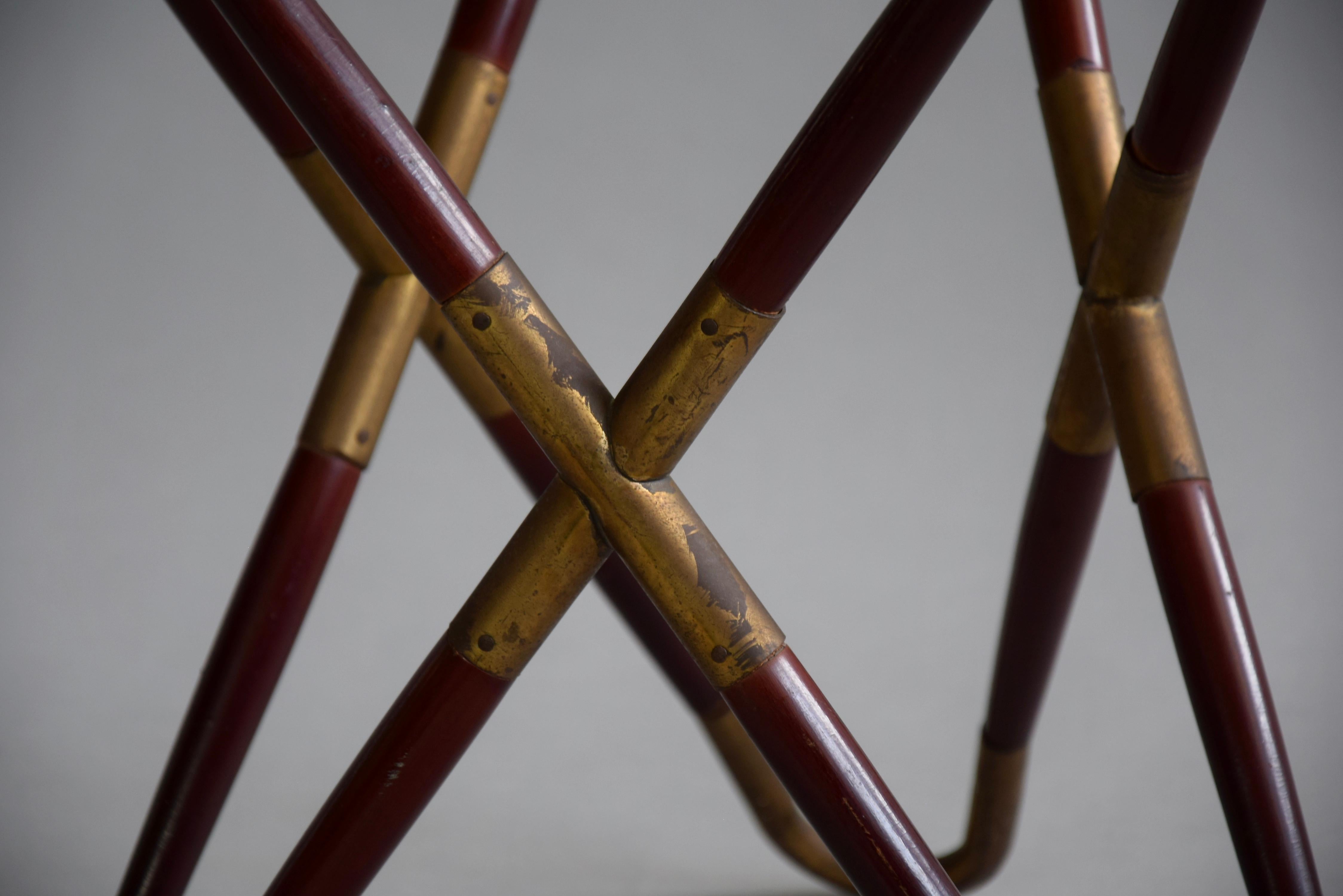 Beautiful Italian mid century brass,glass and wooden side table designed by Cesare Lacca in the 1950s.

The table will be shipped insured overseas in a custom made wooden crate. Cost of transport to the US is crate included.

Born in Naples in