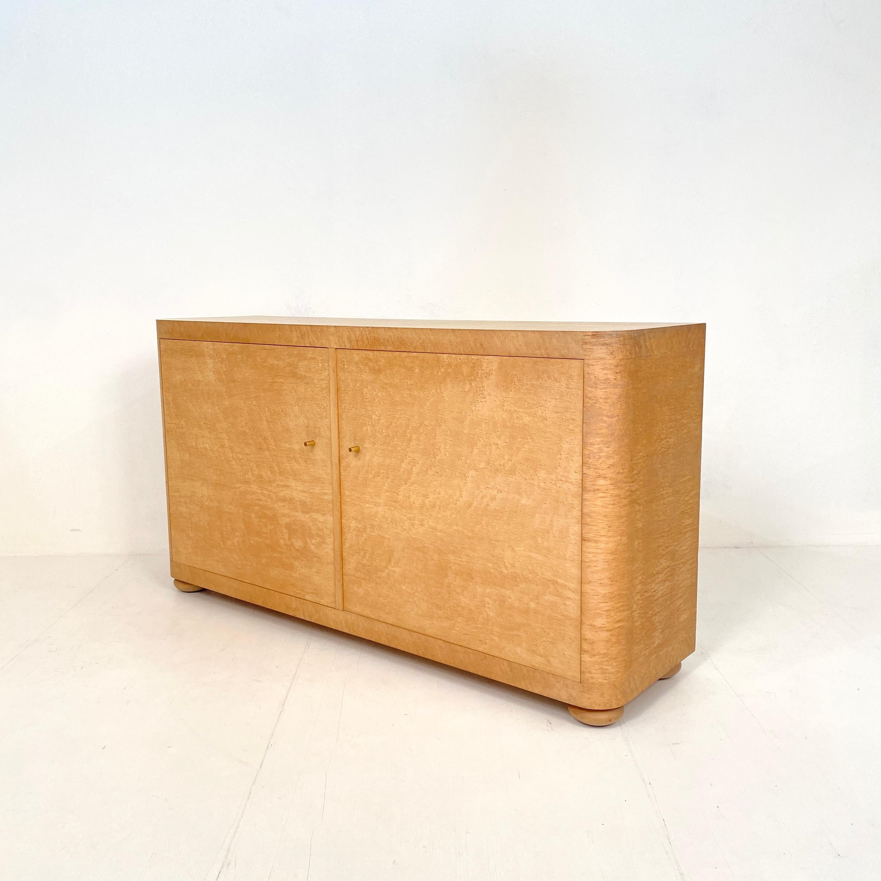 This midcentury Italian sideboard in bird's-eye maple was made, circa 1975.
It is attributed to the Italian manufacturer Saporiti.
It is in fantastic vintage condition and from amazing quality.
A unique piece which is a great eyecatcher for your