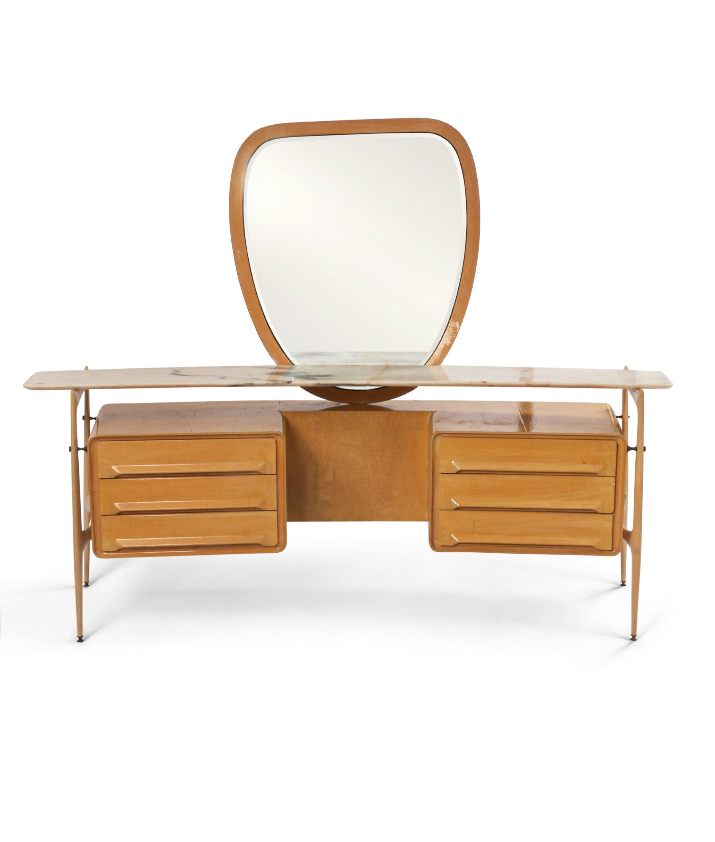 Midcentury Italian maple wood vanity with ovoid center mirror supported on a set of 6 drawers with a marble shelf (Silvio Cavatorta, circa 1950).