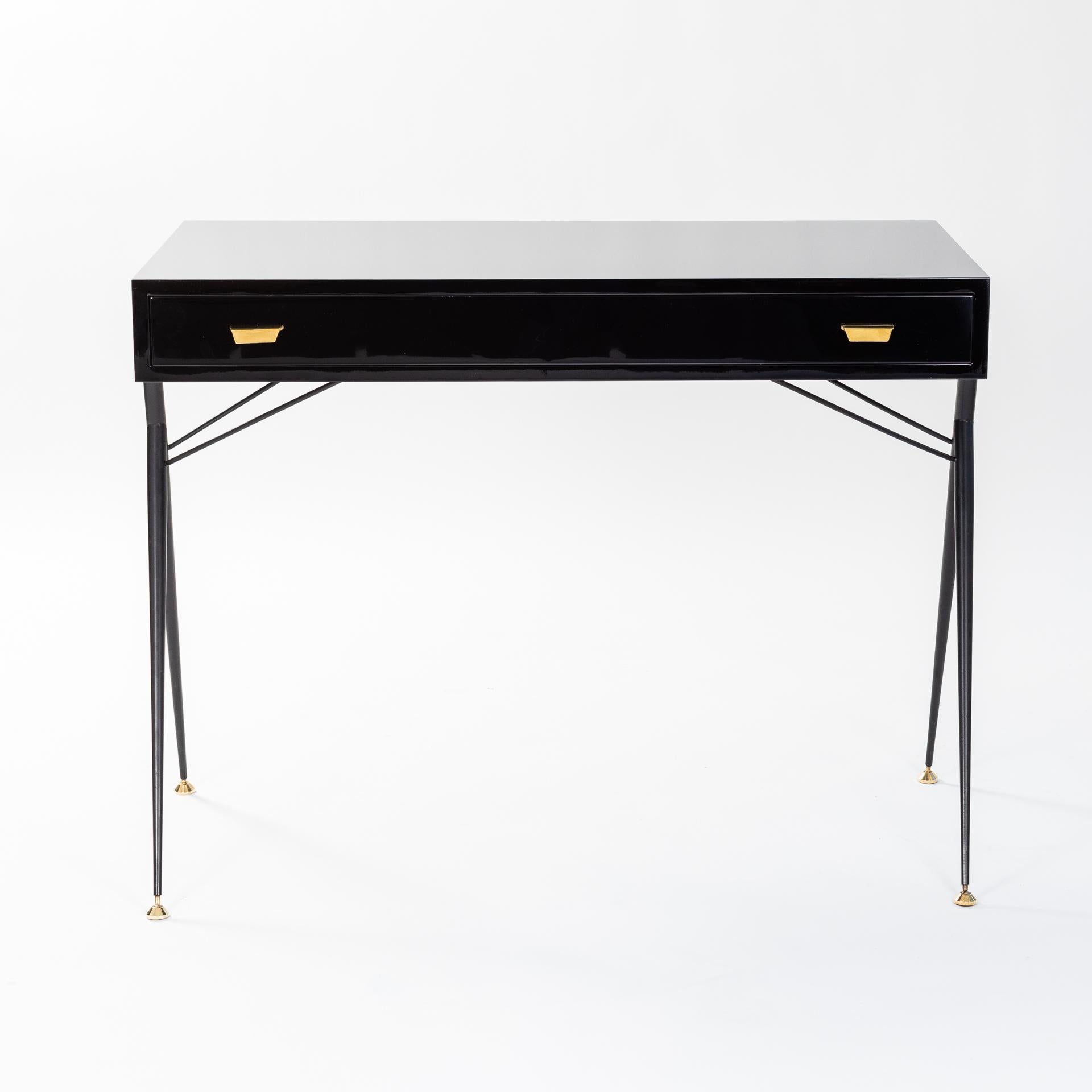 Small desk by Silvio Cavatorta, Italy, 1950s.
Re-painted in black high-gloss lacquer.
Stainless steel base powder-coated in black, fine brass details.
Height-adjustable foot sections
Freely adjustable.