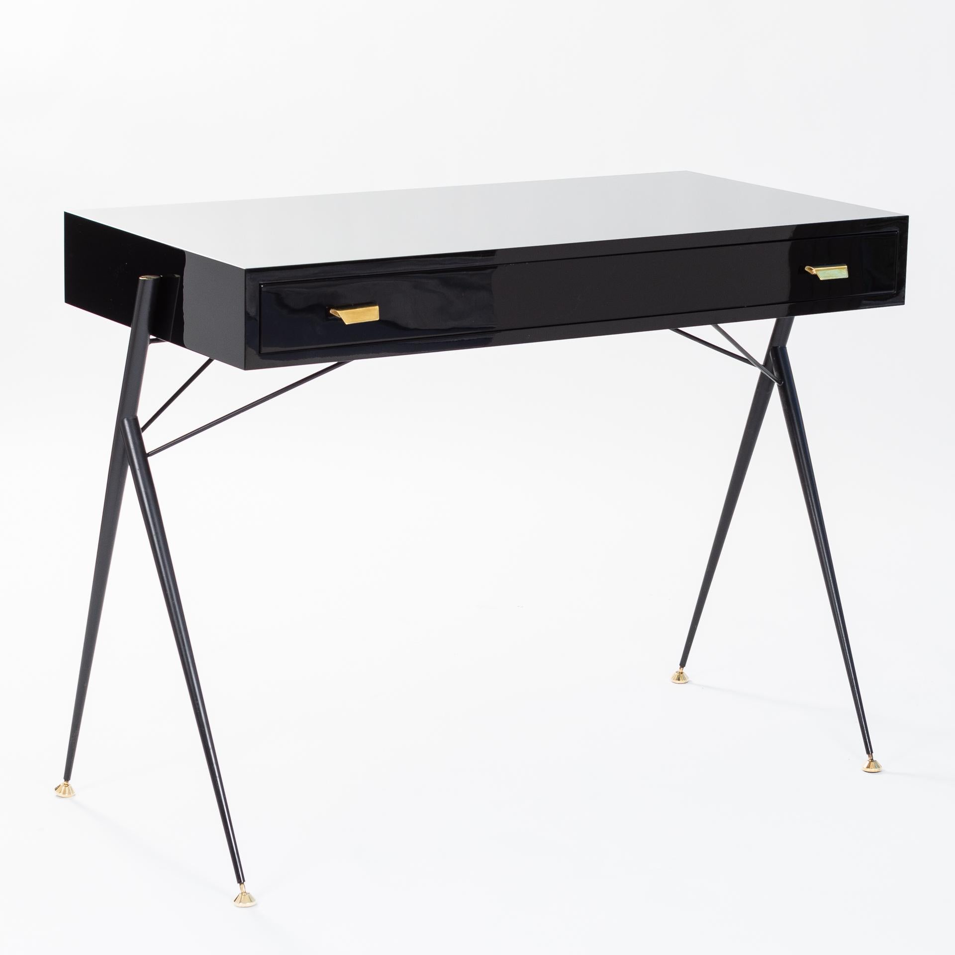 Small desk by Silvio Cavatorta, Italy, 1950s.
Re-painted in black high-gloss lacquer.
Stainless steel base powder-coated in black, fine brass details.
Height-adjustable foot sections
Freely adjustable.