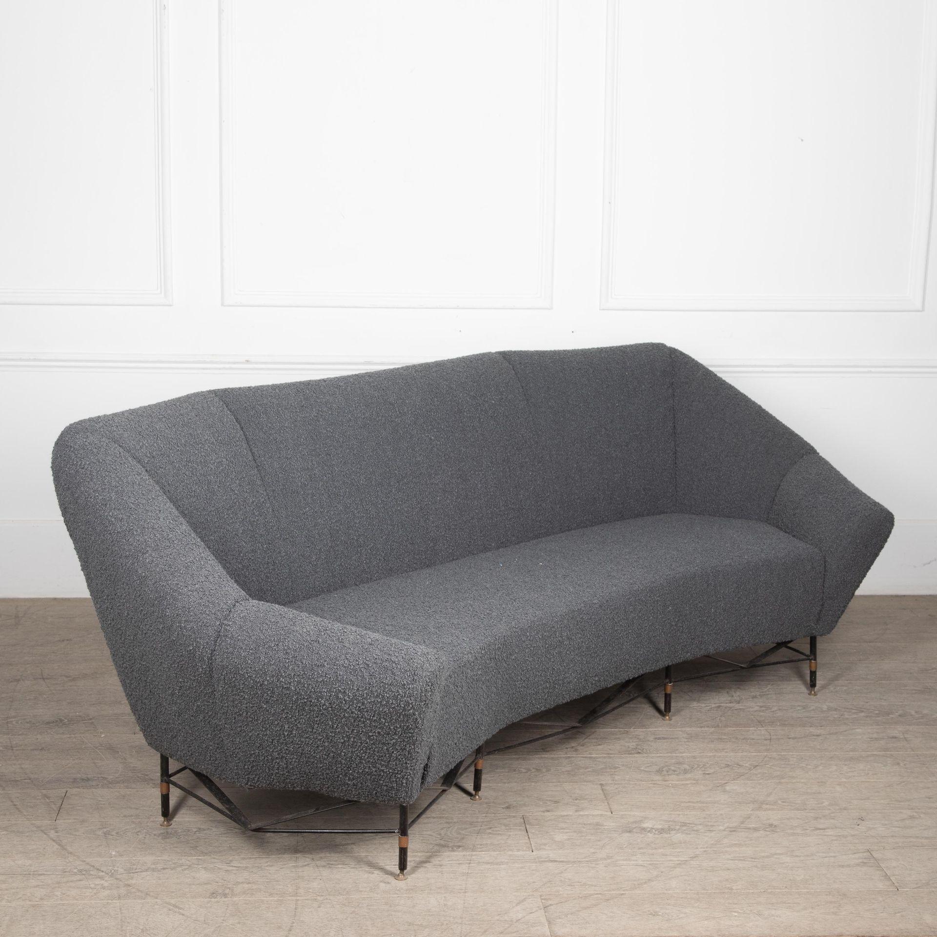 Lovely Mid-Century Italian grey sofa from the 1950s.
Three seater, newly reupholstered with a soft grey bouclet.