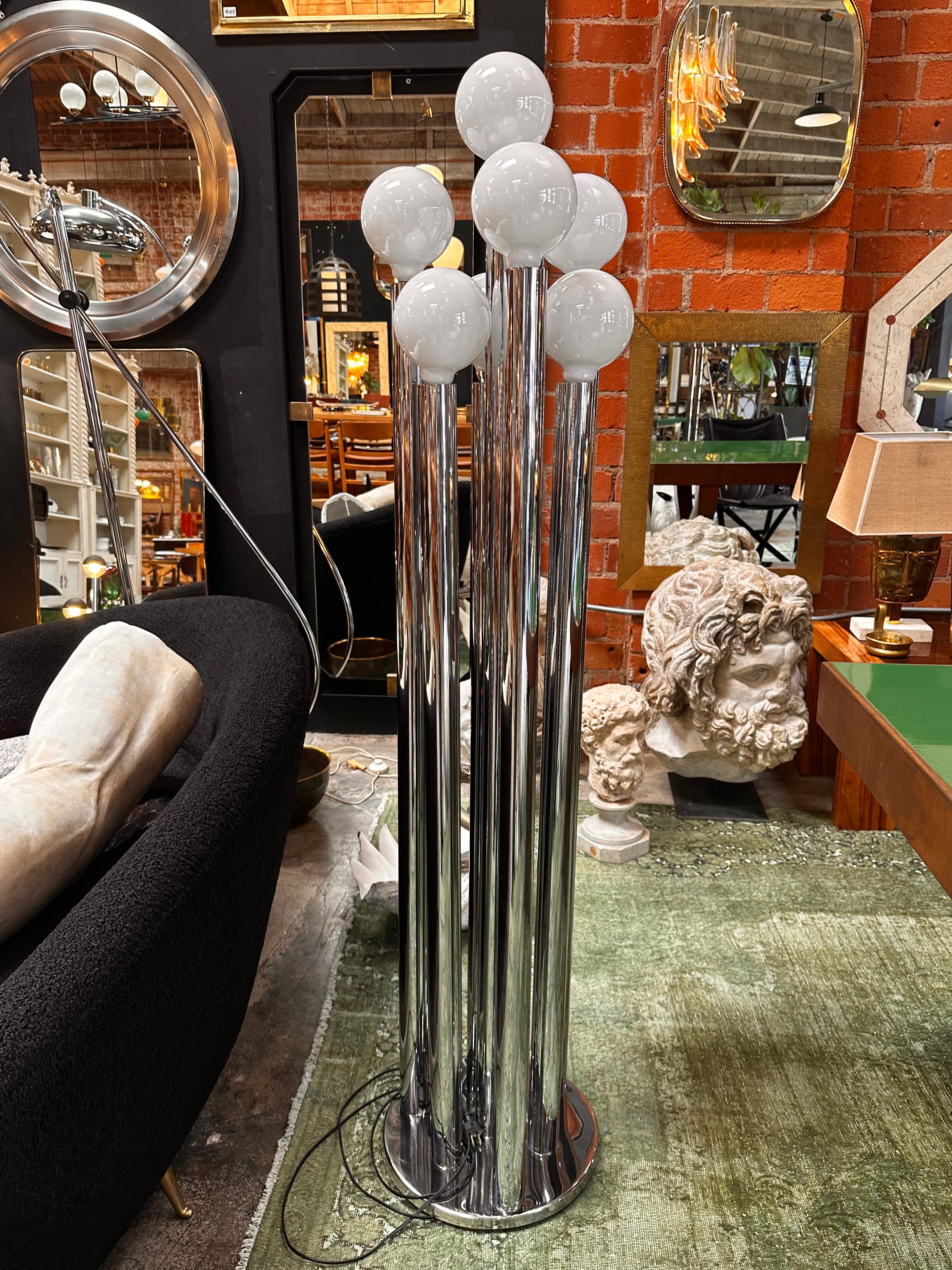The Italian Mid-Century Space Age Floor Lamp from the 1970s is a sleek and futuristic lighting fixture that embodies the artistic and technological spirit of the era. Characterized by its innovative design, clean lines, and use of modern materials,