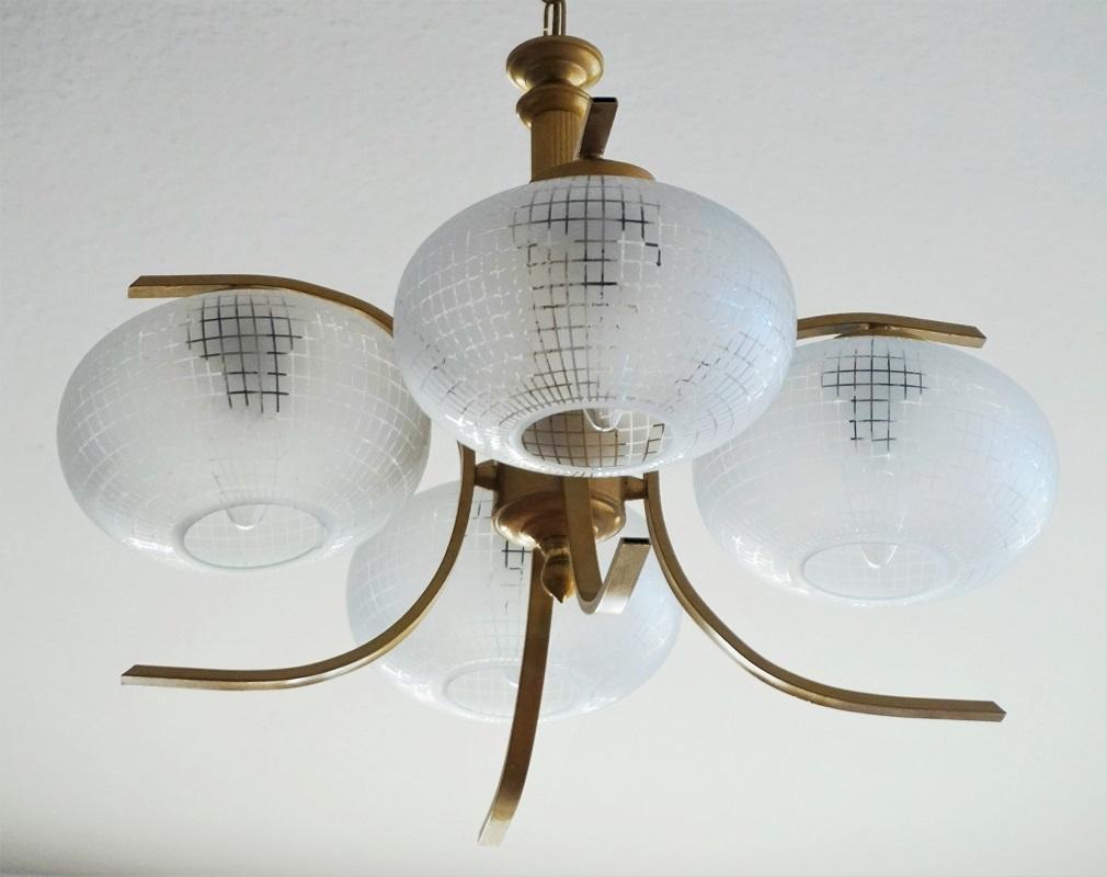 Space Age brass four-light chandelier with large frosted glass globes, Italy, 1960s
Measures:
Overall height 30