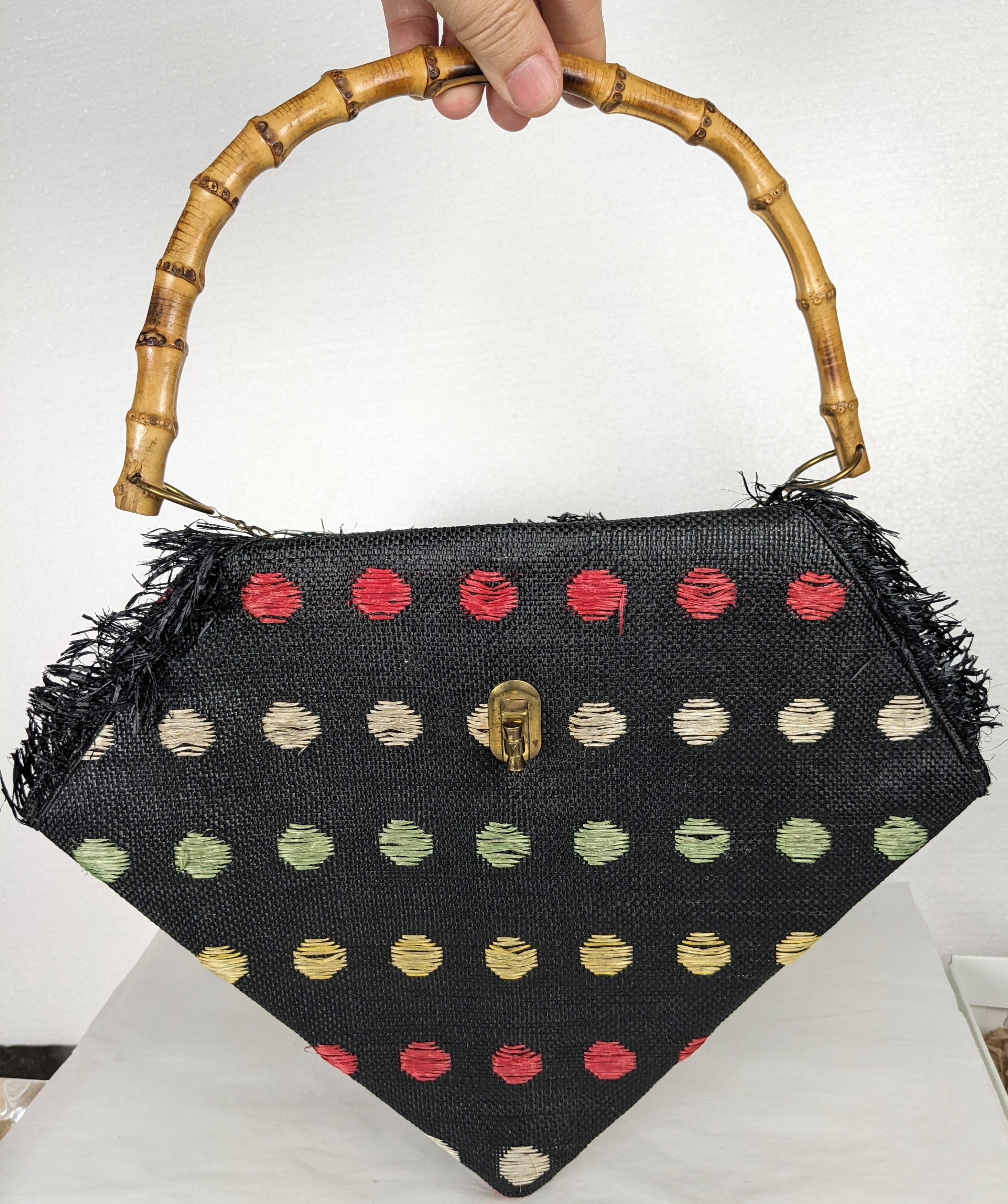 Super Unusual Italian Straw and Raffia Figural Bag from the 1950's. Designed in a triangular form, origami style with 2 compartments. Tiny chains suspended in the center hold the bamboo handle. Colorful woven patterns on the navy straw ground with