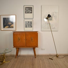 Midcentury Italian Style Brass and Black Lacquered Counterweight Floor Lamp