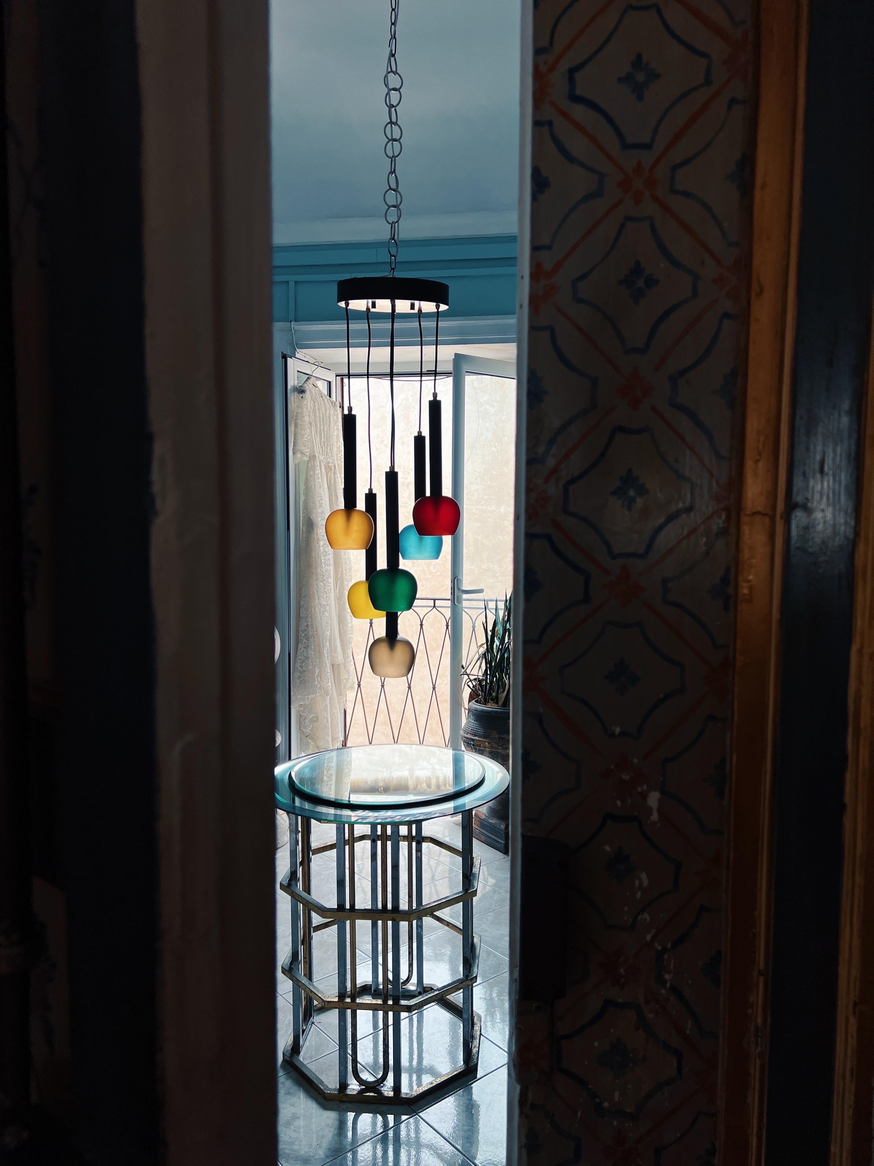 Mid-century Italian suspension light by Vistosi, a prominent Italian lighting design company that was active in the mid-20th century, particularly during the 1950s and 1960s. Vistosi is known for its innovative and modern lighting designs during