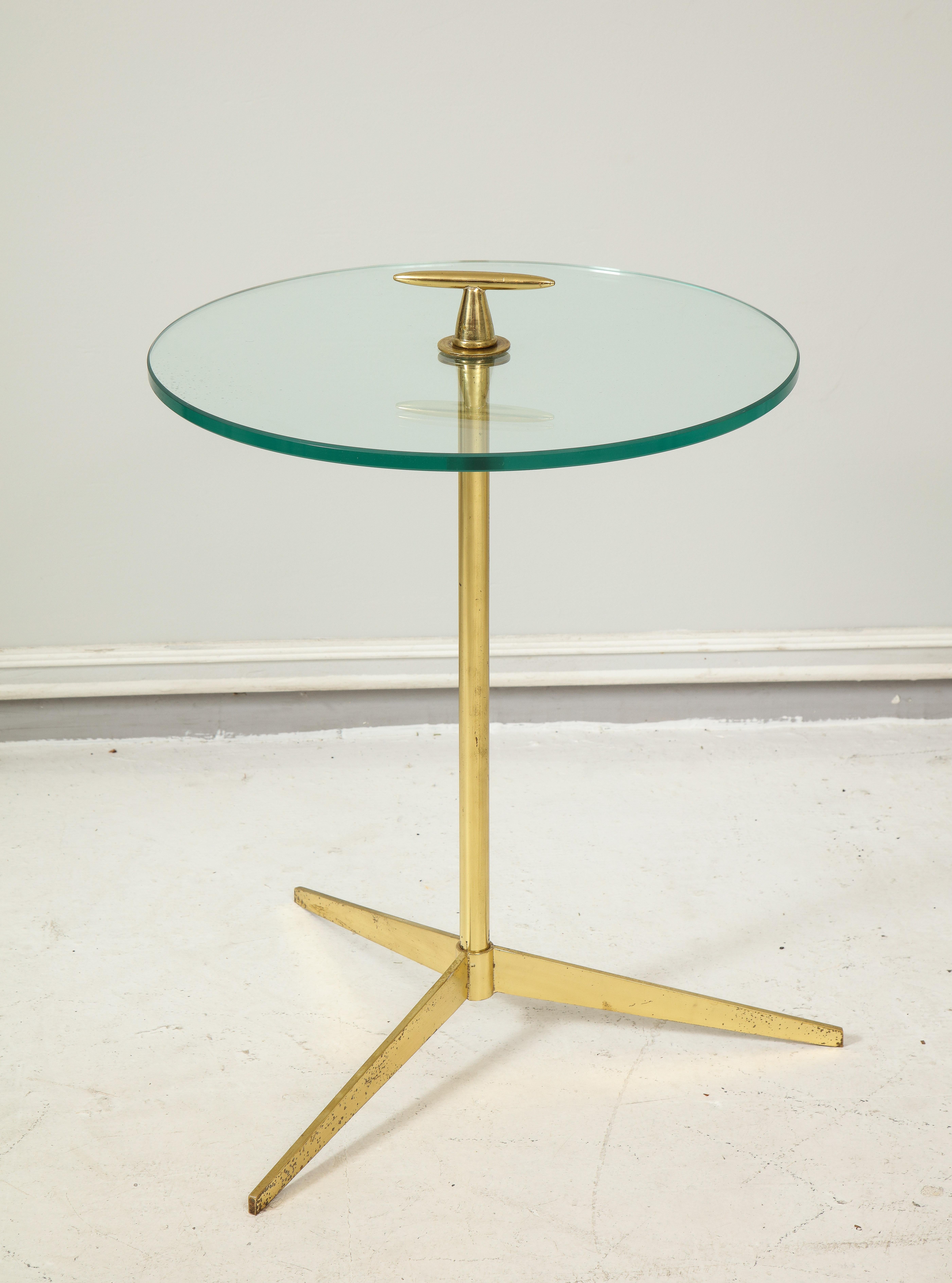 Midcentury Italian table on brass tripod base.