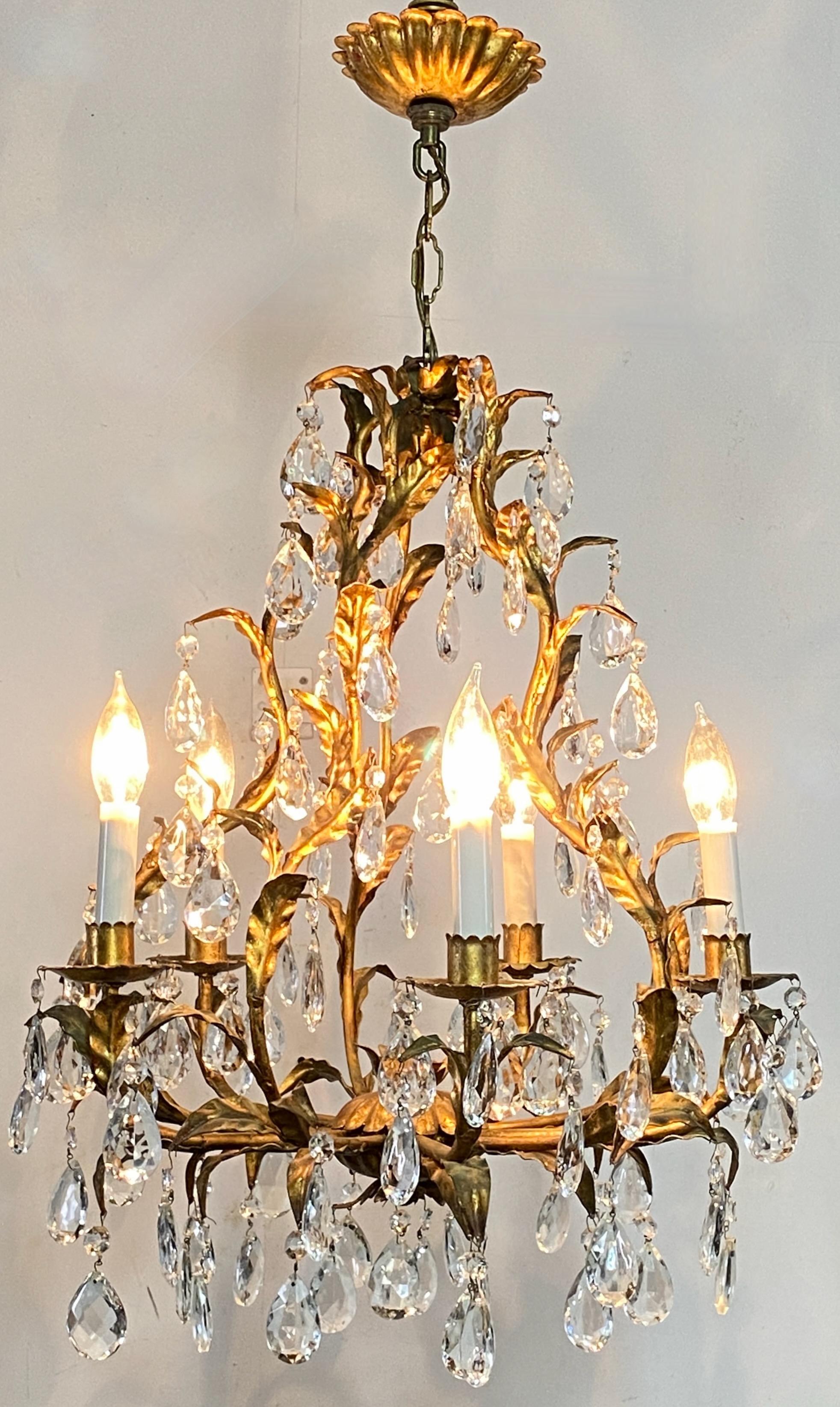 Five light gold painted metal and cut glass multi prism chandelier. 
Cleaned and re-wired, ready to install.
In excellent vintage condition.
Italy, circa 1960.